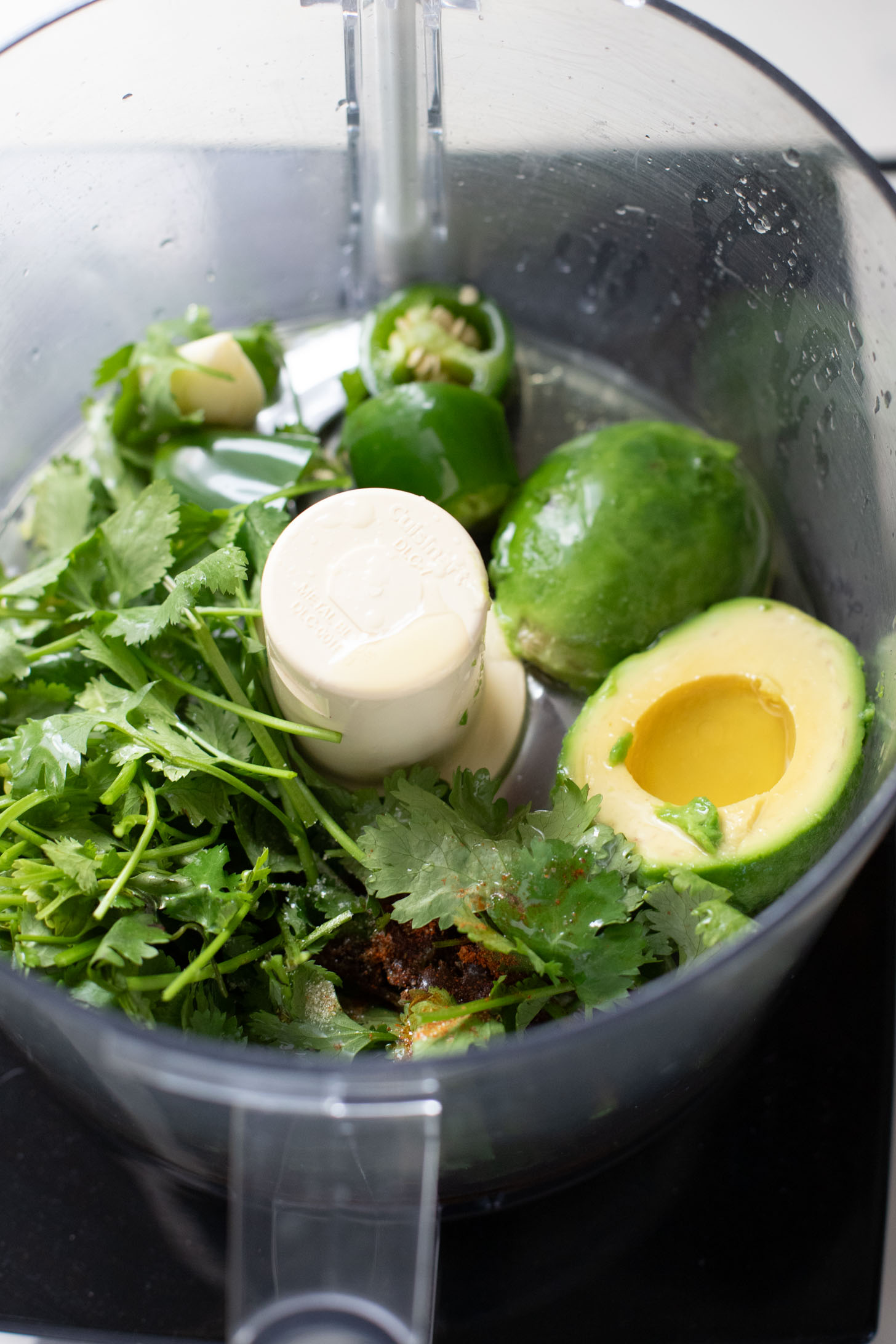 These Roasted Sweet Potato Bowls are layered with couscous, tender roasted sweet potatoes and an avocado cilantro sauce | ThisSavoryVegan.com #thissavoryvegan #grainbowl #veggiebowl