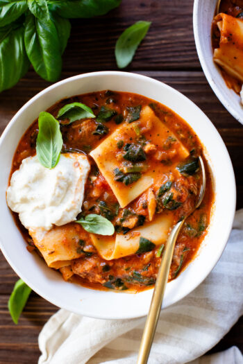 This Vegan Lasagna Soup is comfort food at its best. All the best flavors of lasagna made in one pot. Creamy marinara, vegan sausage, noodles & tofu ricotta | ThisSavoryVegan.com #thissavoryvegan #vegansoup #fallrecipes