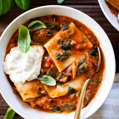This Vegan Lasagna Soup is comfort food at its best. All the best flavors of lasagna made in one pot. Creamy marinara, vegan sausage, noodles & tofu ricotta | ThisSavoryVegan.com #thissavoryvegan #vegansoup #fallrecipes