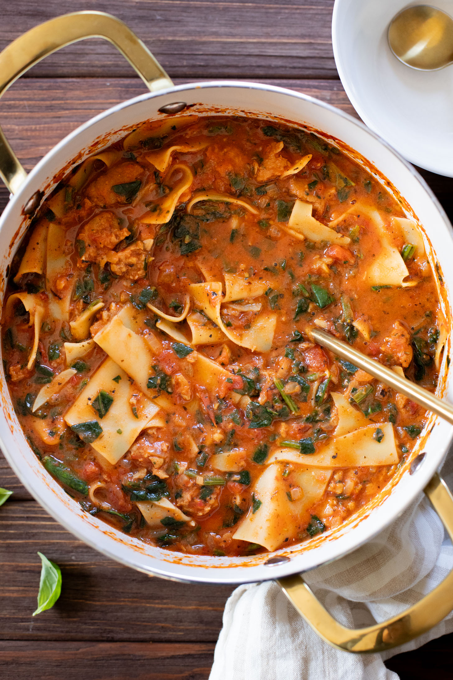 This Vegan Lasagna Soup is comfort food at its best. All the best flavors of lasagna made in one pot. Creamy marinara, vegan sausage, noodles & tofu ricotta | ThisSavoryVegan.com #thissavoryvegan #vegansoup #fallrecipes