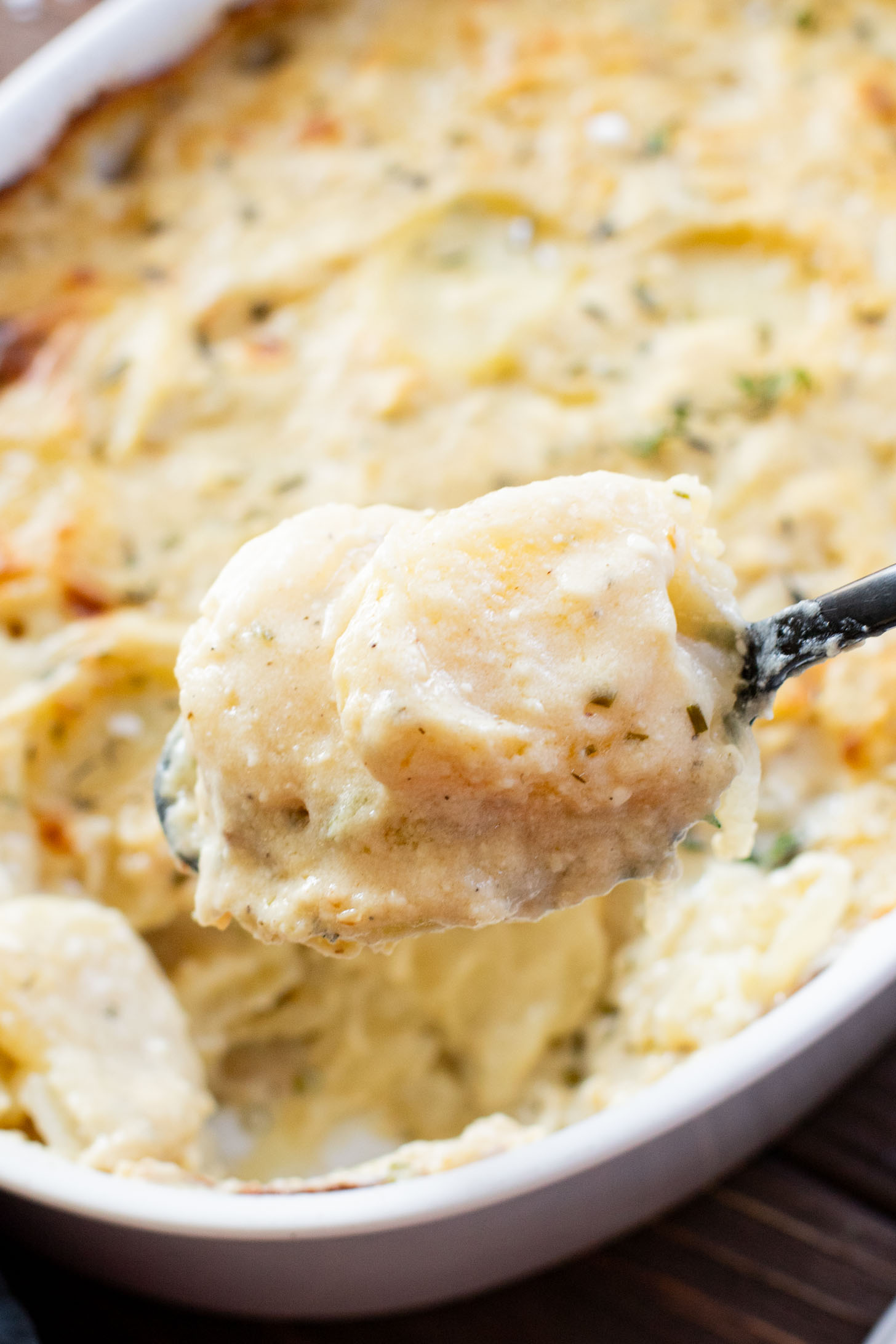 These Vegan Scalloped Potatoes are the perfect holiday side dish. Rich, creamy and 100% dairy free! A must make for your vegan Thanksgiving | ThisSavoryVegan.com #thissavoryvegan #veganthanksgiving #veganholidaysides