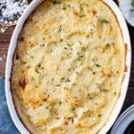 These Vegan Scalloped Potatoes are the perfect holiday side dish. Rich, creamy and 100% dairy free! A must make for your vegan Thanksgiving | ThisSavoryVegan.com #thissavoryvegan #veganthanksgiving #veganholidaysides