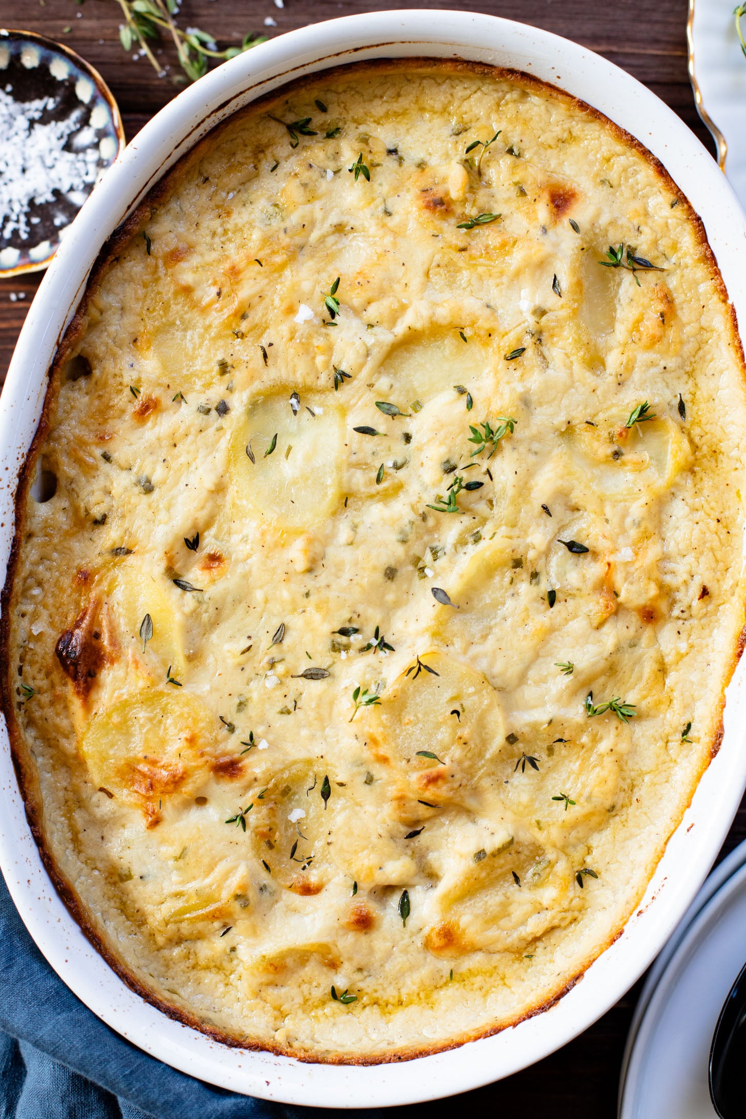 These Vegan Scalloped Potatoes are the perfect holiday side dish. Rich, creamy and 100% dairy free! A must make for your vegan Thanksgiving | ThisSavoryVegan.com #thissavoryvegan #veganthanksgiving #veganholidaysides