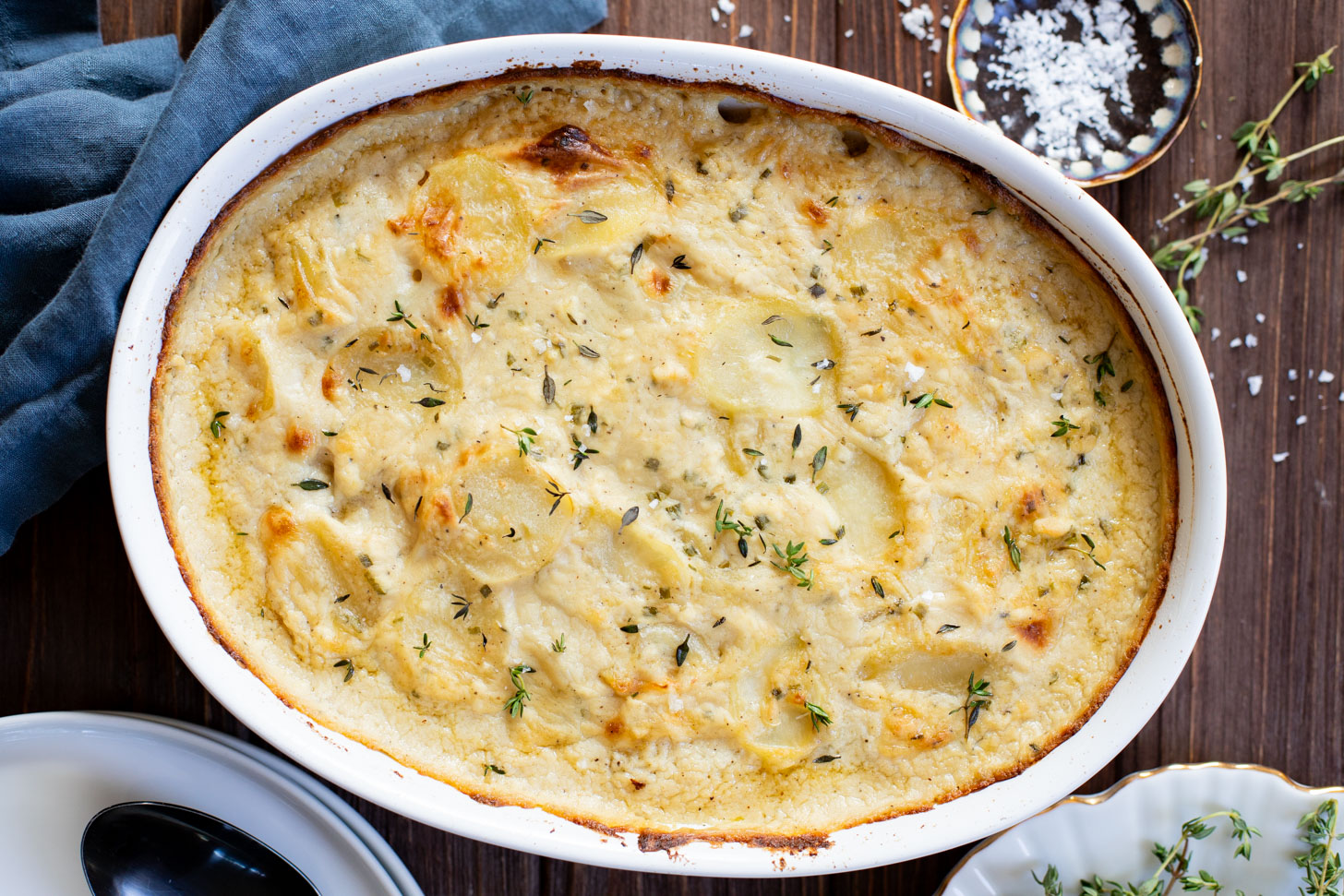 These Vegan Scalloped Potatoes are the perfect holiday side dish. Rich, creamy and 100% dairy free! A must make for your vegan Thanksgiving | ThisSavoryVegan.com #thissavoryvegan #veganthanksgiving #veganholidaysides