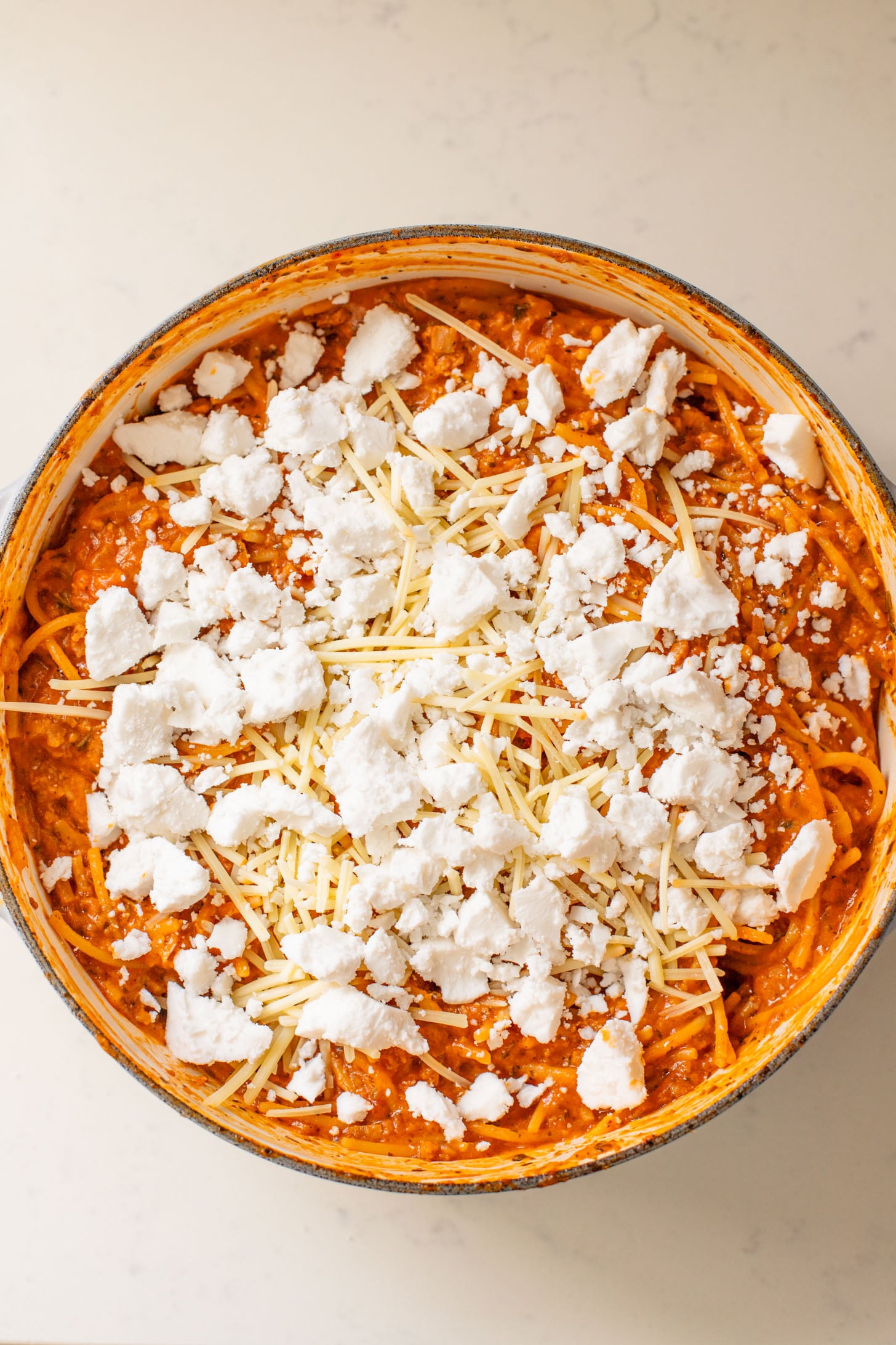 This Baked Spaghetti Bolognese is a one-pot vegan dinner that is comfort food at its best! Creamy pasta topped with melty vegan cheese | ThisSavoryVegan.com #pastabake #veganpasta #thissavoryvegan