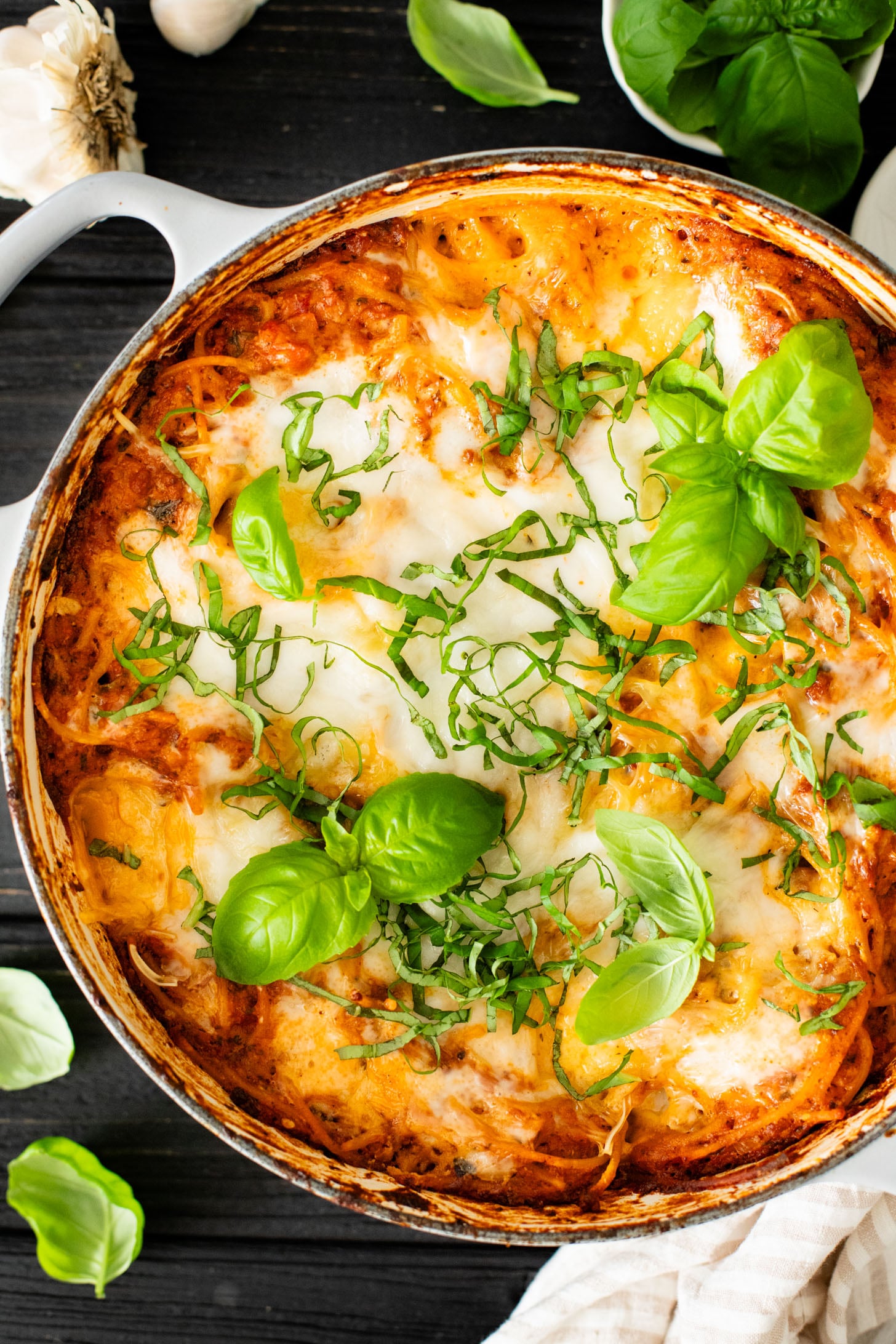 This Baked Spaghetti Bolognese is a one-pot vegan dinner that is comfort food at its best! Creamy pasta topped with melty vegan cheese | ThisSavoryVegan.com #pastabake #veganpasta #thissavoryvegan