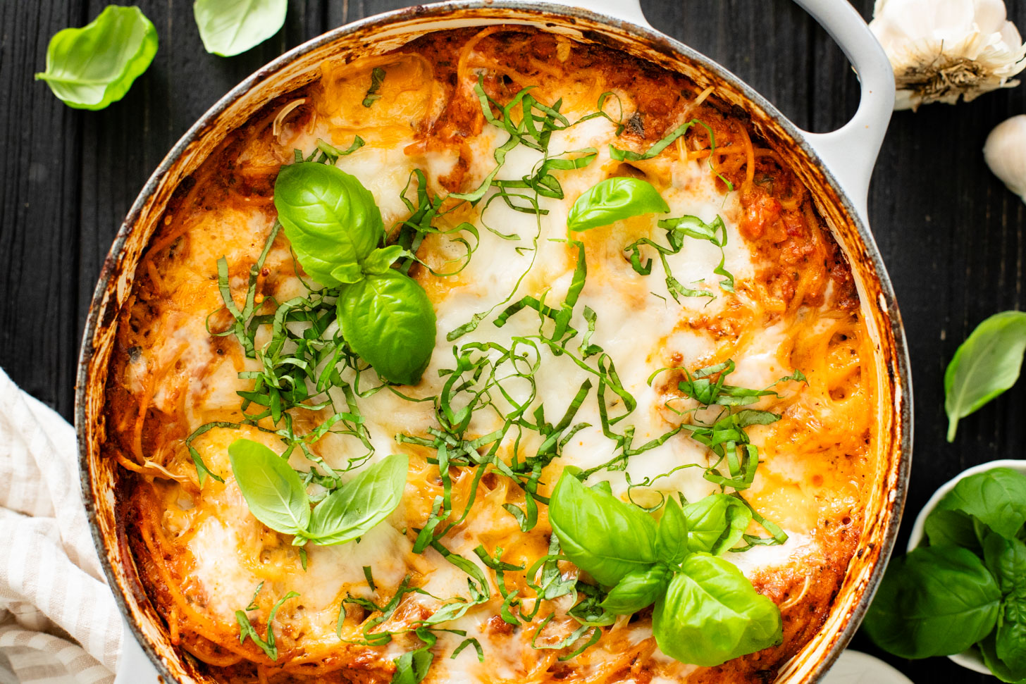 This Baked Spaghetti Bolognese is a one-pot vegan dinner that is comfort food at its best! Creamy pasta topped with melty vegan cheese | ThisSavoryVegan.com #pastabake #veganpasta #thissavoryvegan