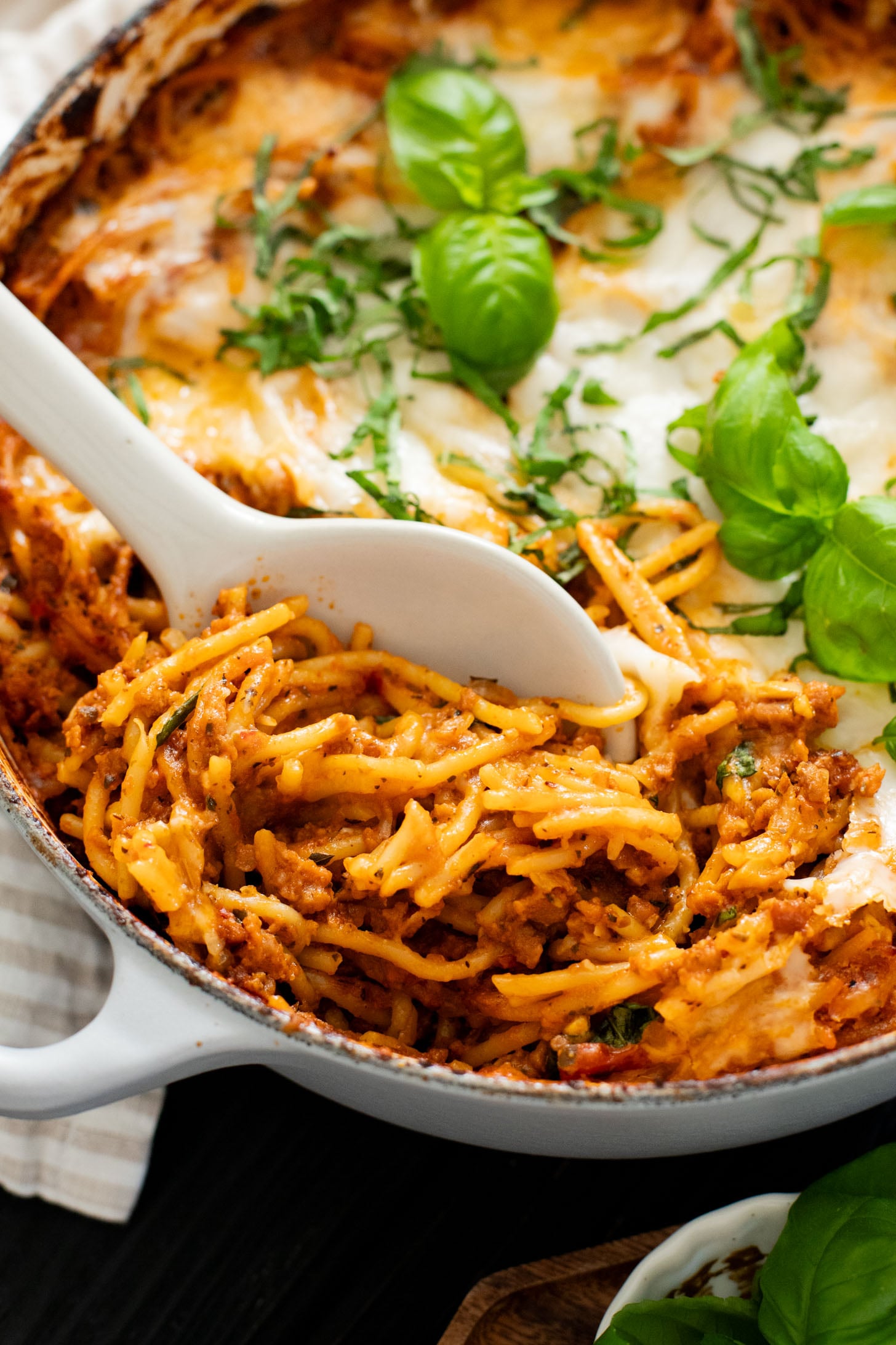This Baked Spaghetti Bolognese is a one-pot vegan dinner that is comfort food at its best! Creamy pasta topped with melty vegan cheese | ThisSavoryVegan.com #pastabake #veganpasta #thissavoryvegan