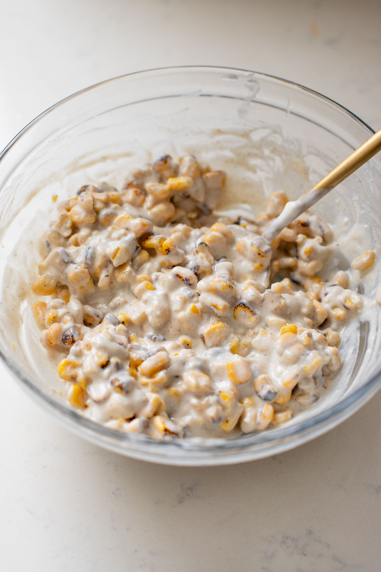 This Black Bean Tortilla Enchilada Rice Bake is a one-pot vegan dinner that is packed with veggies, rice, beans, corn salad and crispy tortillas | ThisSavoryVegan.com #thissavoryvegan #dumpandbake #vegancasserole