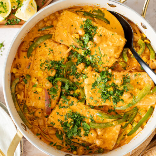 This Creamy Cajun Tofu Skillet is a comforting and veggie-packed skillet dinner. Made with a dairy-free cream sauce, crispy tofu, chickpeas & veggies | ThisSavoryVegan.com #thissavoryvegan #skilletdinners #easytofurecipes