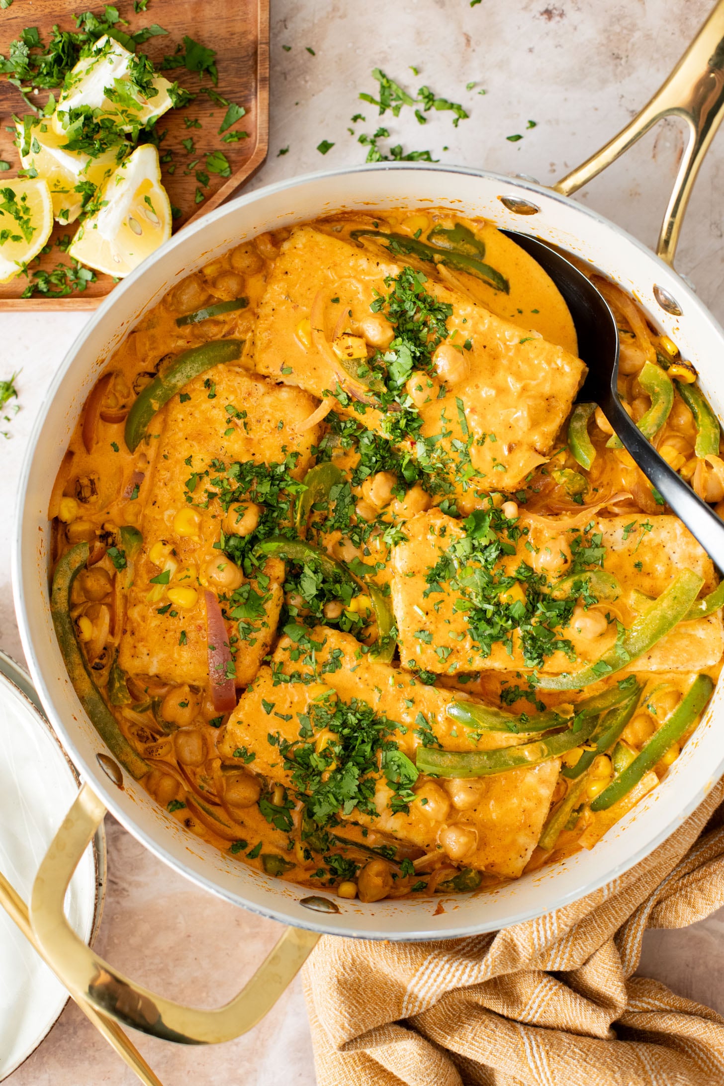 This Creamy Cajun Tofu Skillet is a comforting and veggie-packed skillet dinner. Made with a dairy-free cream sauce, crispy tofu, chickpeas & veggies | ThisSavoryVegan.com #thissavoryvegan #skilletdinners #easytofurecipes
