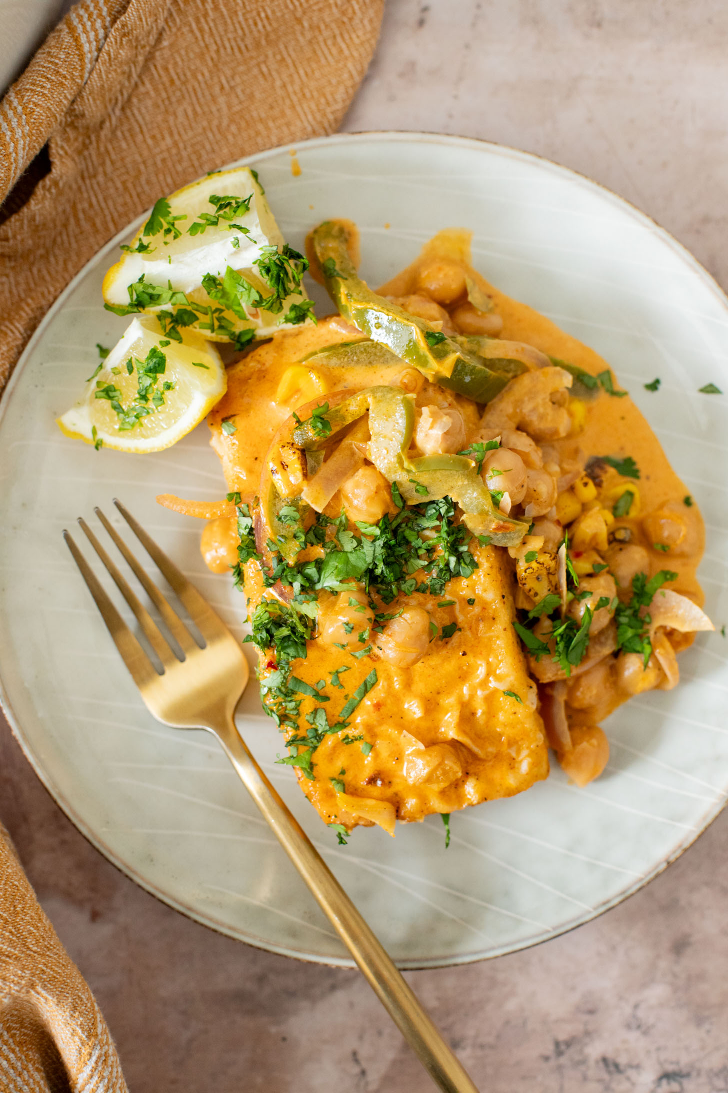 This Creamy Cajun Tofu Skillet is a comforting and veggie-packed skillet dinner. Made with a dairy-free cream sauce, crispy tofu, chickpeas & veggies | ThisSavoryVegan.com #thissavoryvegan #skilletdinners #easytofurecipes
