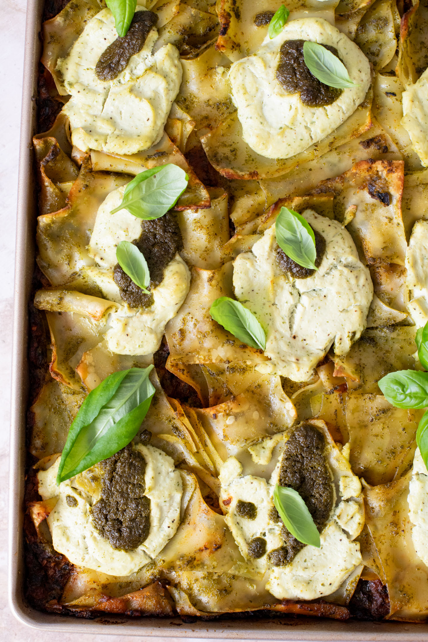 This Pesto Mushroom Sheet Pan Lasagna takes the work out of lasagna. A dairy-free lasagna recipe that doesn't skip on flavor | ThisSavoryVegan.com #thissavoryvegan #veganlasagna #veganpesto