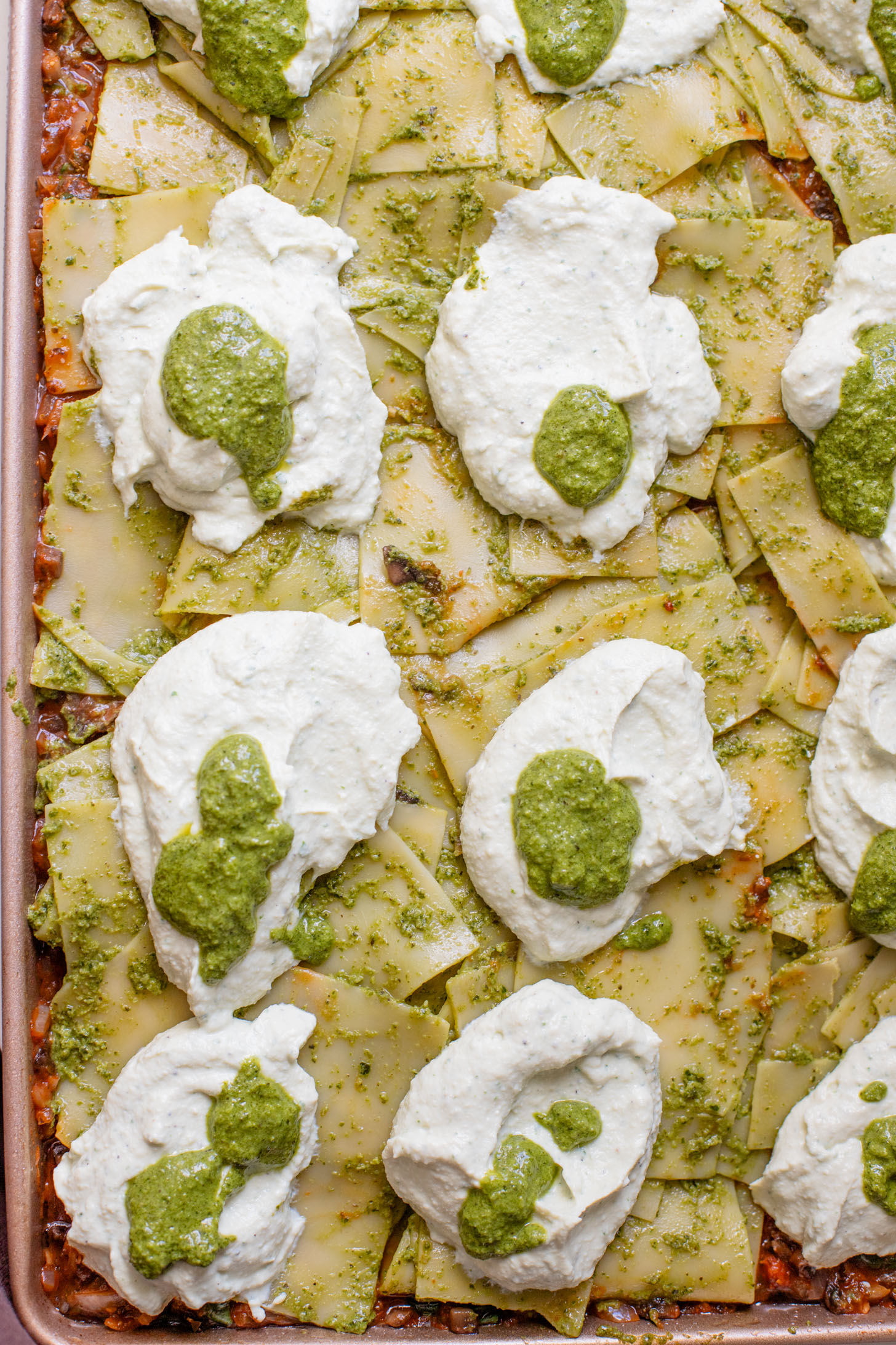 This Pesto Mushroom Sheet Pan Lasagna takes the work out of lasagna. A dairy-free lasagna recipe that doesn't skip on flavor | ThisSavoryVegan.com #thissavoryvegan #veganlasagna #veganpesto