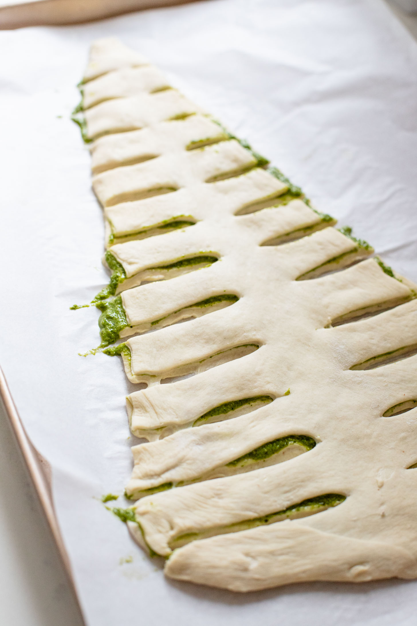 This Pesto Pull-Apart Christmas Tree is the best holiday appetizer! Filled with vegan pesto and topped with garlic butter | ThisSavoryVegan.com #christmasrecipes #christmasappetizers #holidaypartyfood
