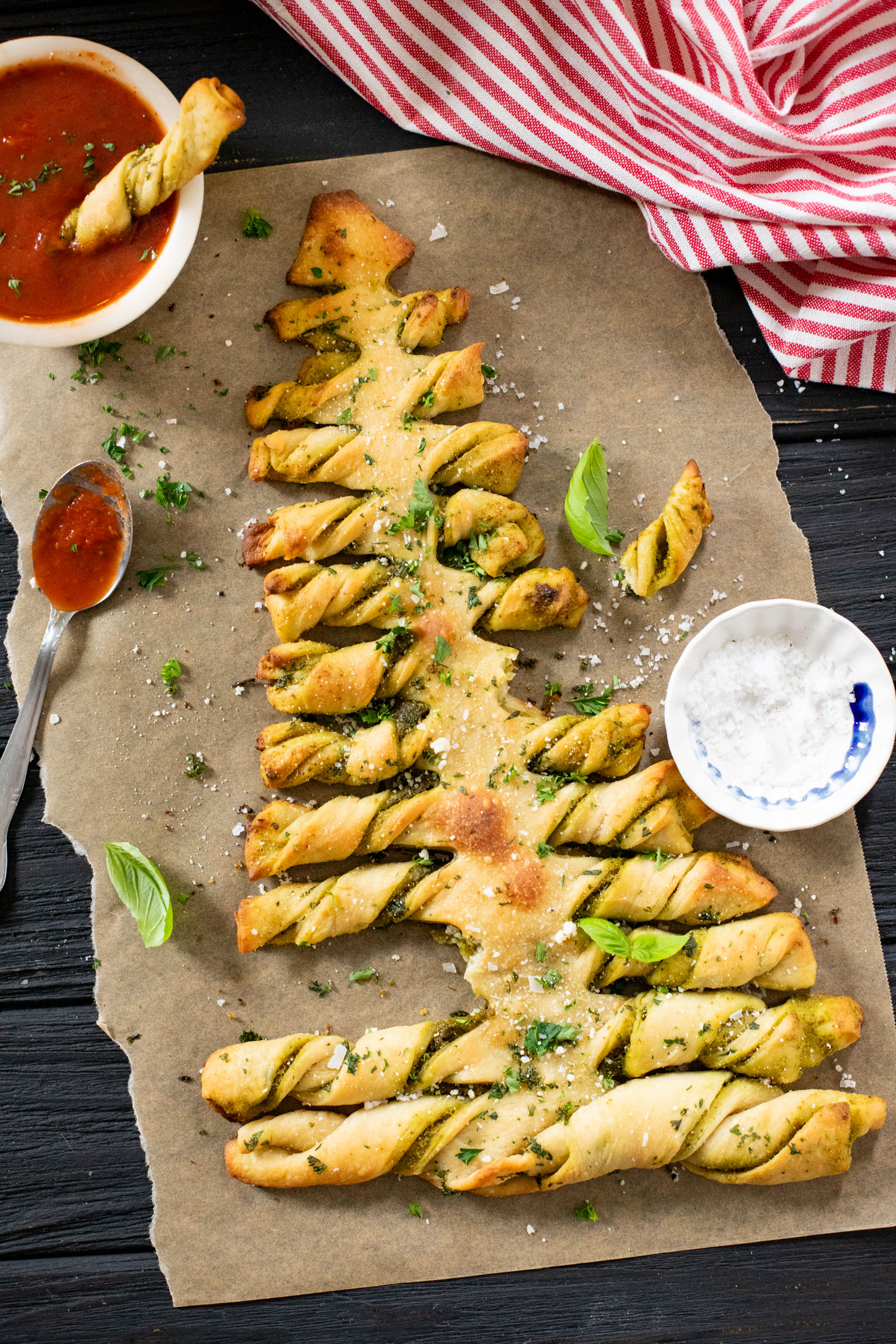 This Pesto Pull-Apart Christmas Tree is the best holiday appetizer! Filled with vegan pesto and topped with garlic butter | ThisSavoryVegan.com #christmasrecipes #christmasappetizers #holidaypartyfood