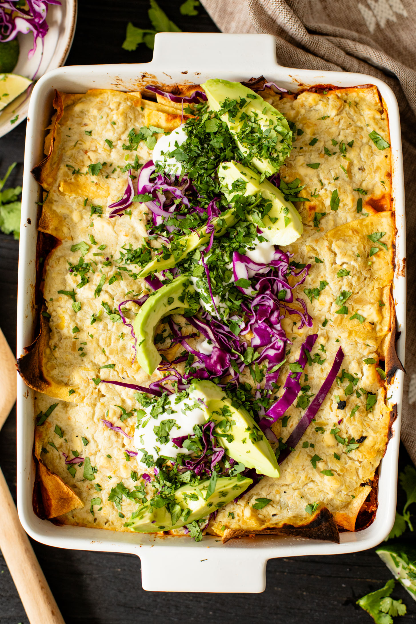 This Sweet Potato Quinoa Enchilada Bake is a simple weeknight dinner idea that is plant-based, easy and totally delicious | ThisSavoryVegan.com #thissavoryvegan #weeknightdinners #enchiladacasserole