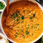 This Vegan Beef & Rice Skillet doesn't really have beef or rice, but sort of. Vegan soy beef crumbles & cauliflower rice are cooked in a creamy sauce | ThisSavoryVegan.com #thissavoryvegan #lowcarbvegan #skilletdinners