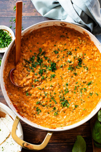 This Vegan Beef & Rice Skillet doesn't really have beef or rice, but sort of. Vegan soy beef crumbles & cauliflower rice are cooked in a creamy sauce | ThisSavoryVegan.com #thissavoryvegan #lowcarbvegan #skilletdinners