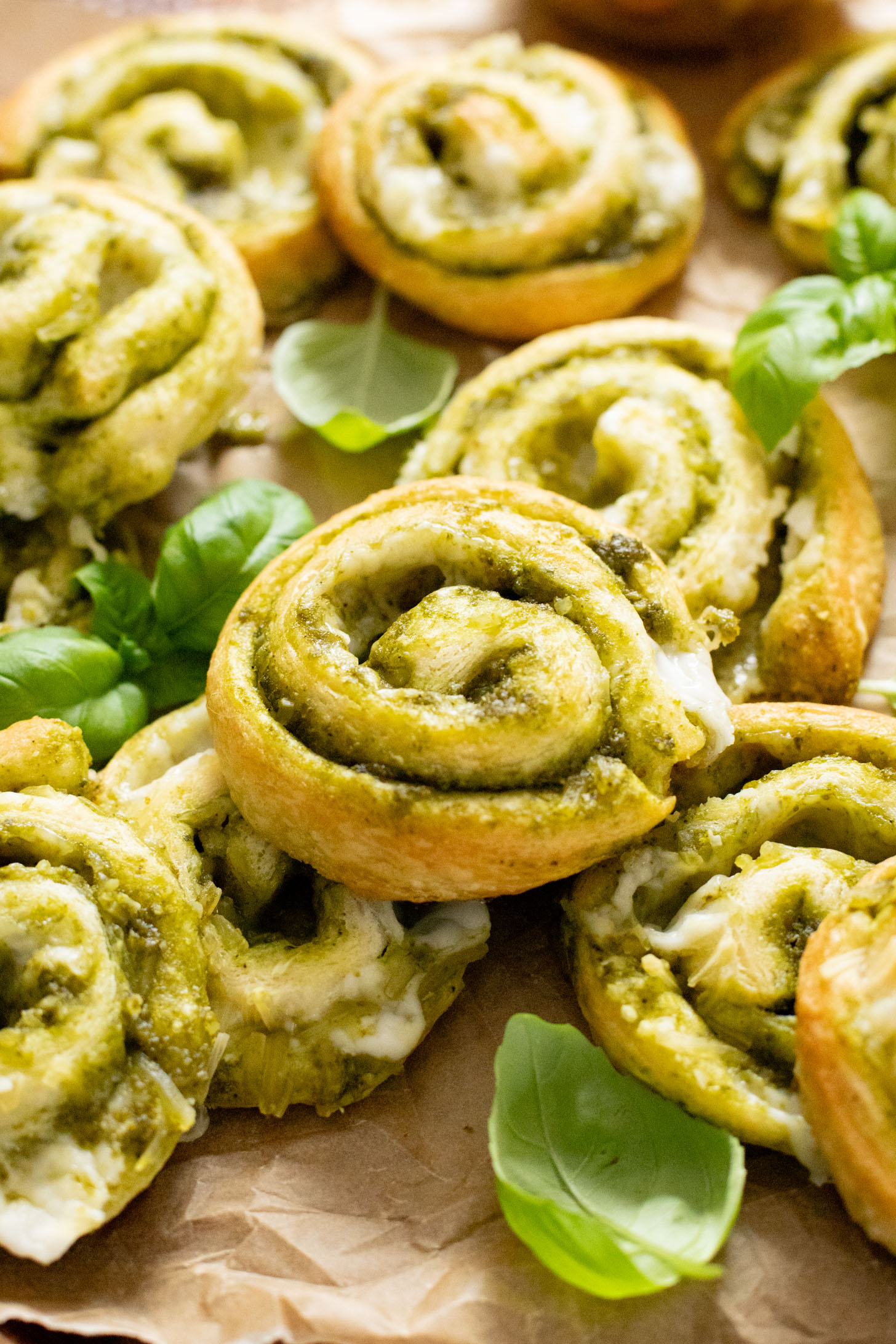 The perfect party appetizer, these Vegan Pesto & Feta Pinwheels only require 4 ingredients and 25 minutes. Tasty and simple | ThisSavoryVegan.com #thissavoryvegan #veganappetizers #holidayappetizers