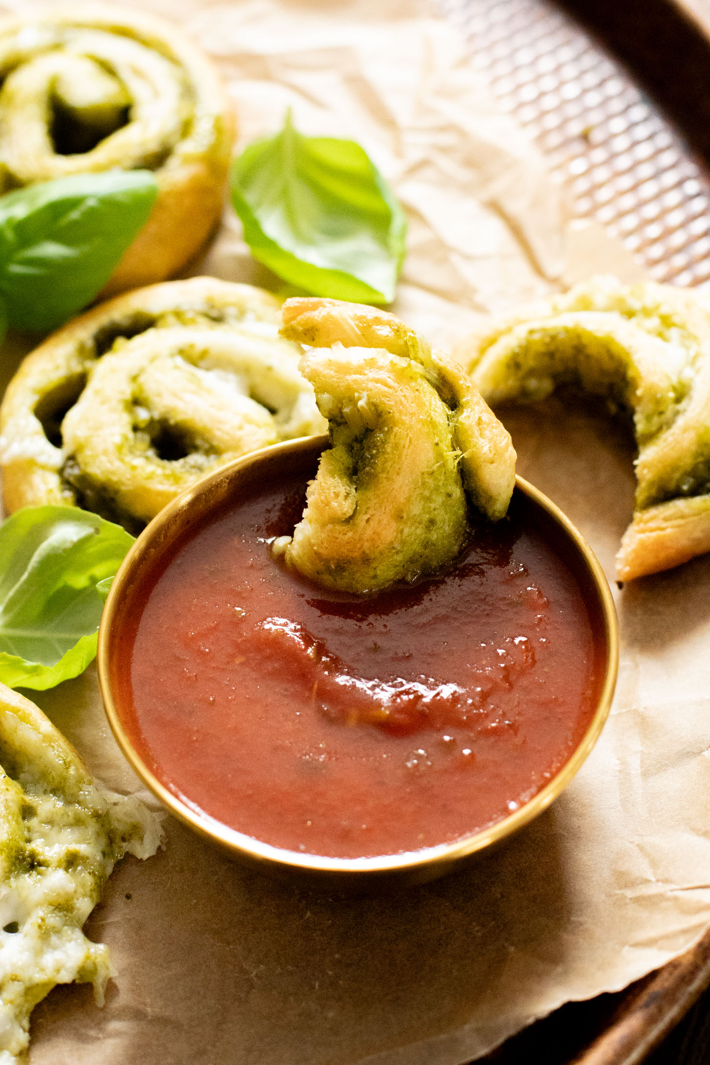 The perfect party appetizer, these Vegan Pesto & Feta Pinwheels only require 4 ingredients and 25 minutes. Tasty and simple | ThisSavoryVegan.com #thissavoryvegan #veganappetizers #holidayappetizers