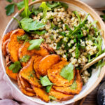 This Chimichurri Couscous & Roasted Sweet Potatoes recipe is healthy, comfort food. Pearl couscous tossed in homemade chimichurri & topped with seasoned sweet potatoes | ThisSavoryVegan.com #thissavoryvegan #couscousrecipes #roastedpotatoes