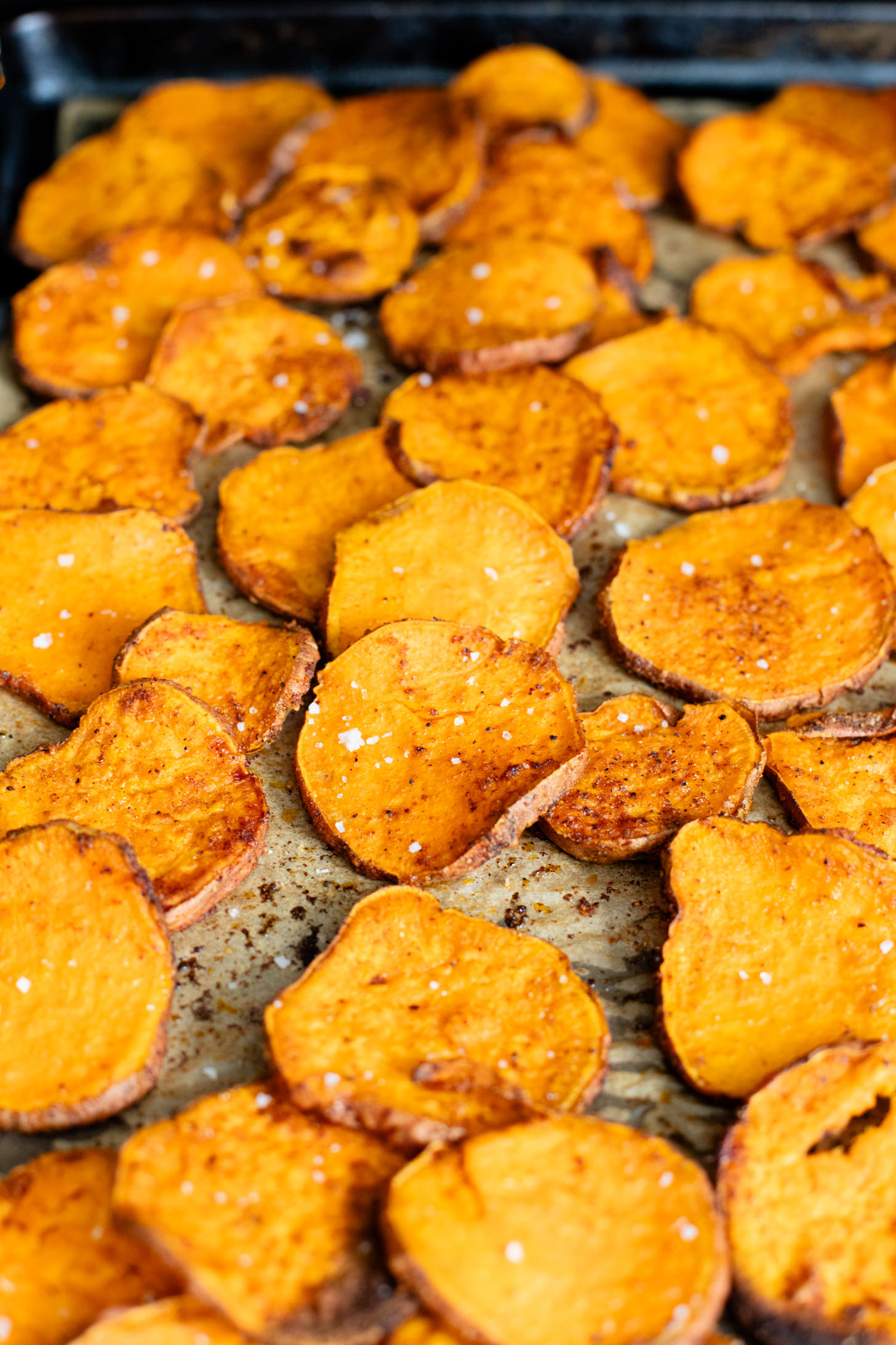 This Chimichurri Couscous & Roasted Sweet Potatoes recipe is healthy, comfort food. Pearl couscous tossed in homemade chimichurri & topped with seasoned sweet potatoes | ThisSavoryVegan.com #thissavoryvegan #couscousrecipes #roastedpotatoes