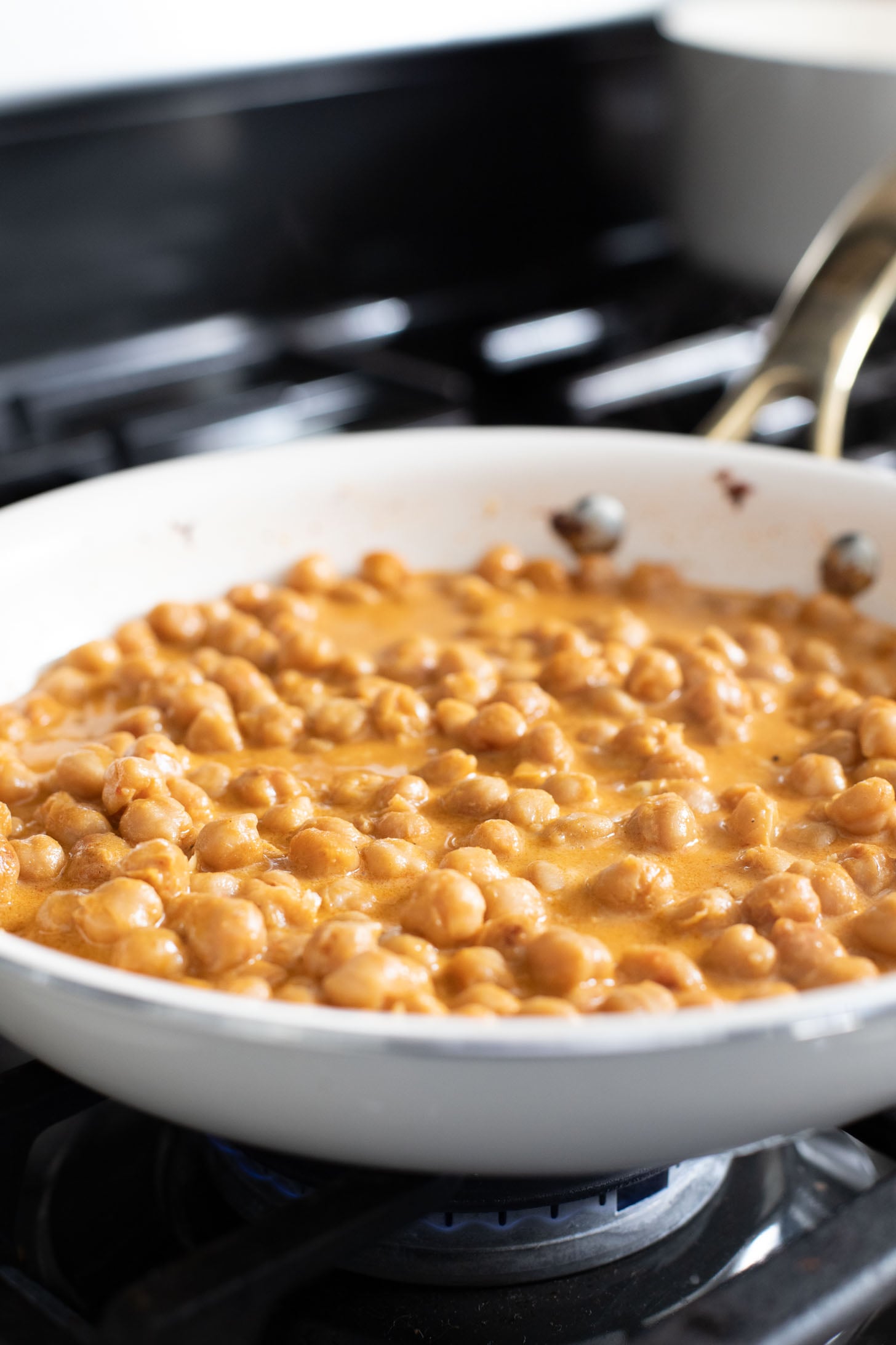 Red Curry Chickpeas & Broccoli Rice is the perfect vegan weeknight dinner idea! Healthy, veggie-packed rice and chickpeas in coconut curry sauce | ThisSavoryVegan.com #thissavoryvegan #veganweeknightdinner #veggierecipes