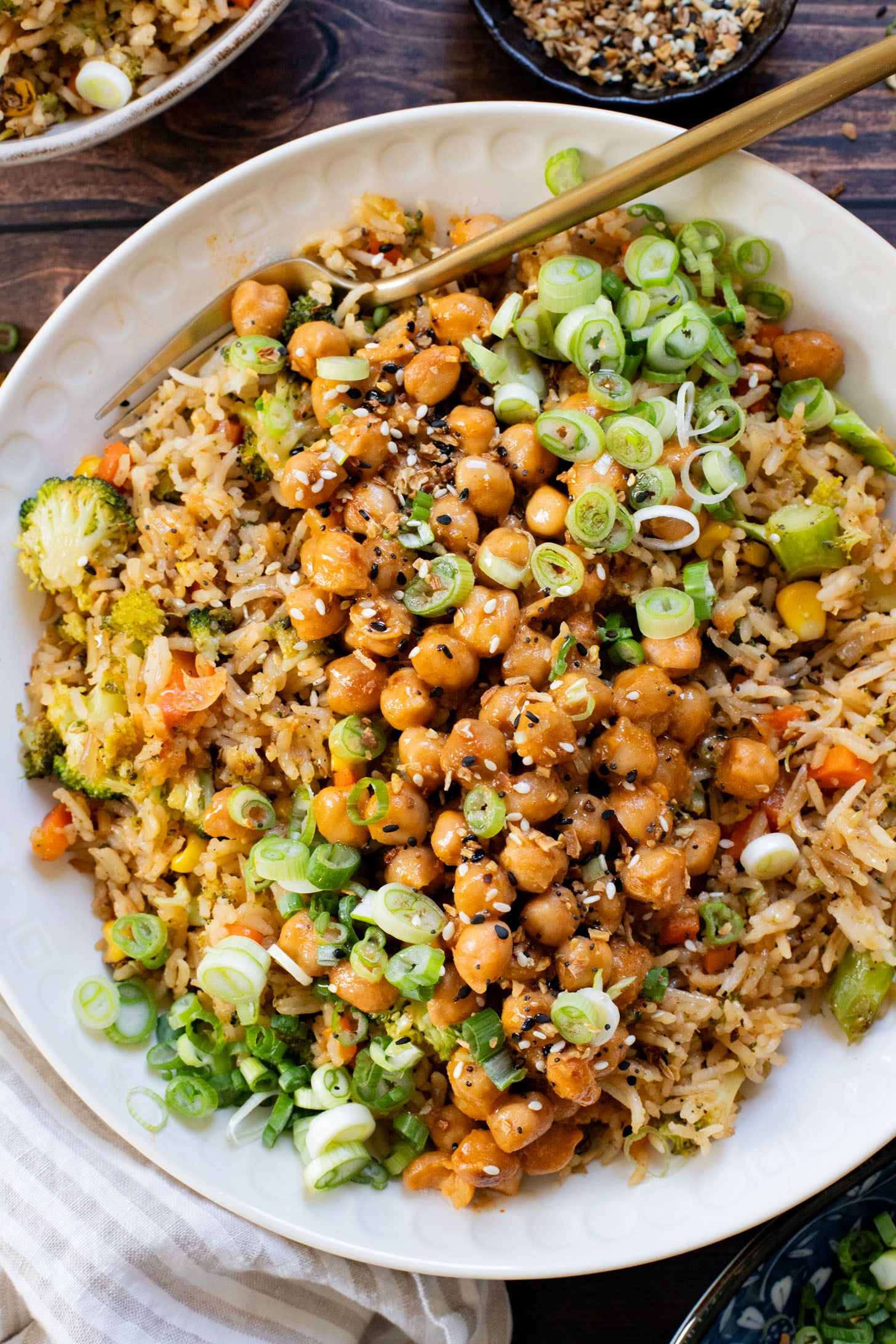 Red Curry Chickpeas & Broccoli Rice is the perfect vegan weeknight dinner idea! Healthy, veggie-packed rice and chickpeas in coconut curry sauce | ThisSavoryVegan.com #thissavoryvegan #veganweeknightdinner #veggierecipes