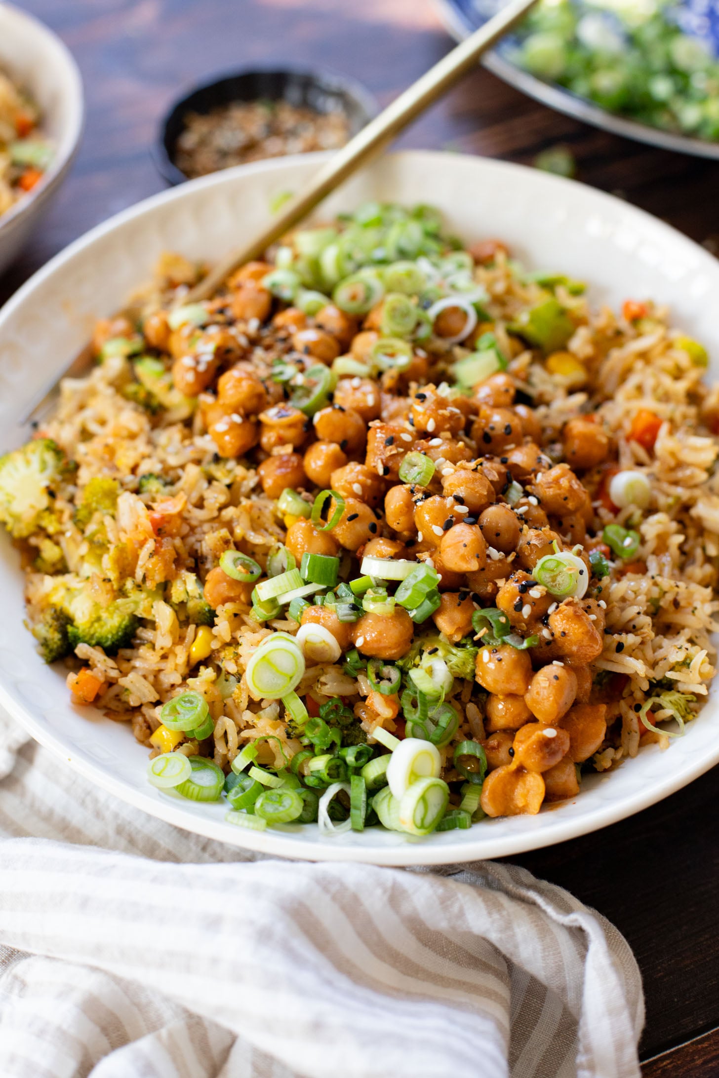 Red Curry Chickpeas & Broccoli Rice is the perfect vegan weeknight dinner idea! Healthy, veggie-packed rice and chickpeas in coconut curry sauce | ThisSavoryVegan.com #thissavoryvegan #veganweeknightdinner #veggierecipes