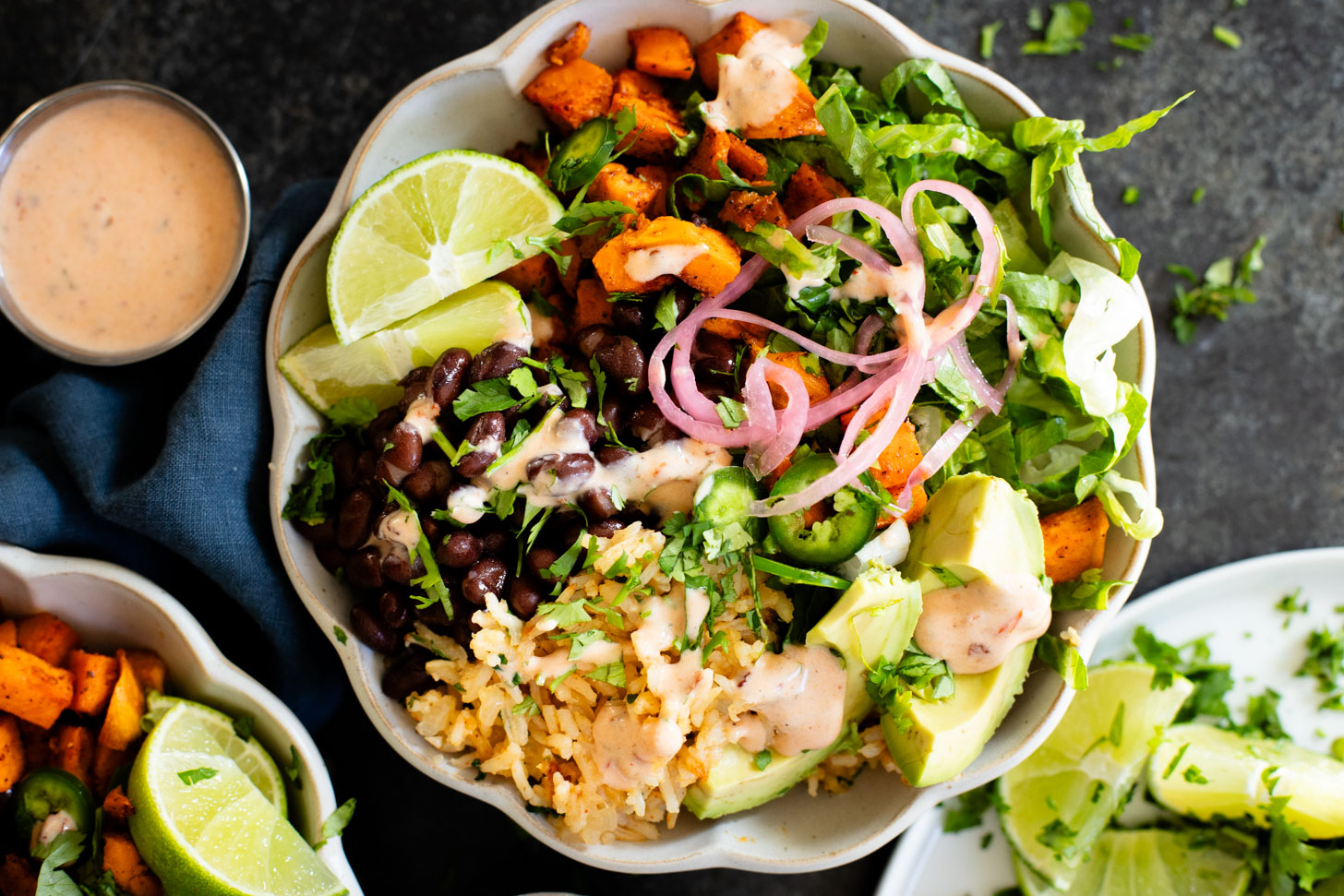These Cauliflower Rice Sweet Potato Bowls are better tasting vegan Chipotle burrito bowls. A plant-based dinner everyone will love | ThisSavoryVegan.com #thissavoryvegan #grainbowls #veganchipotledupe