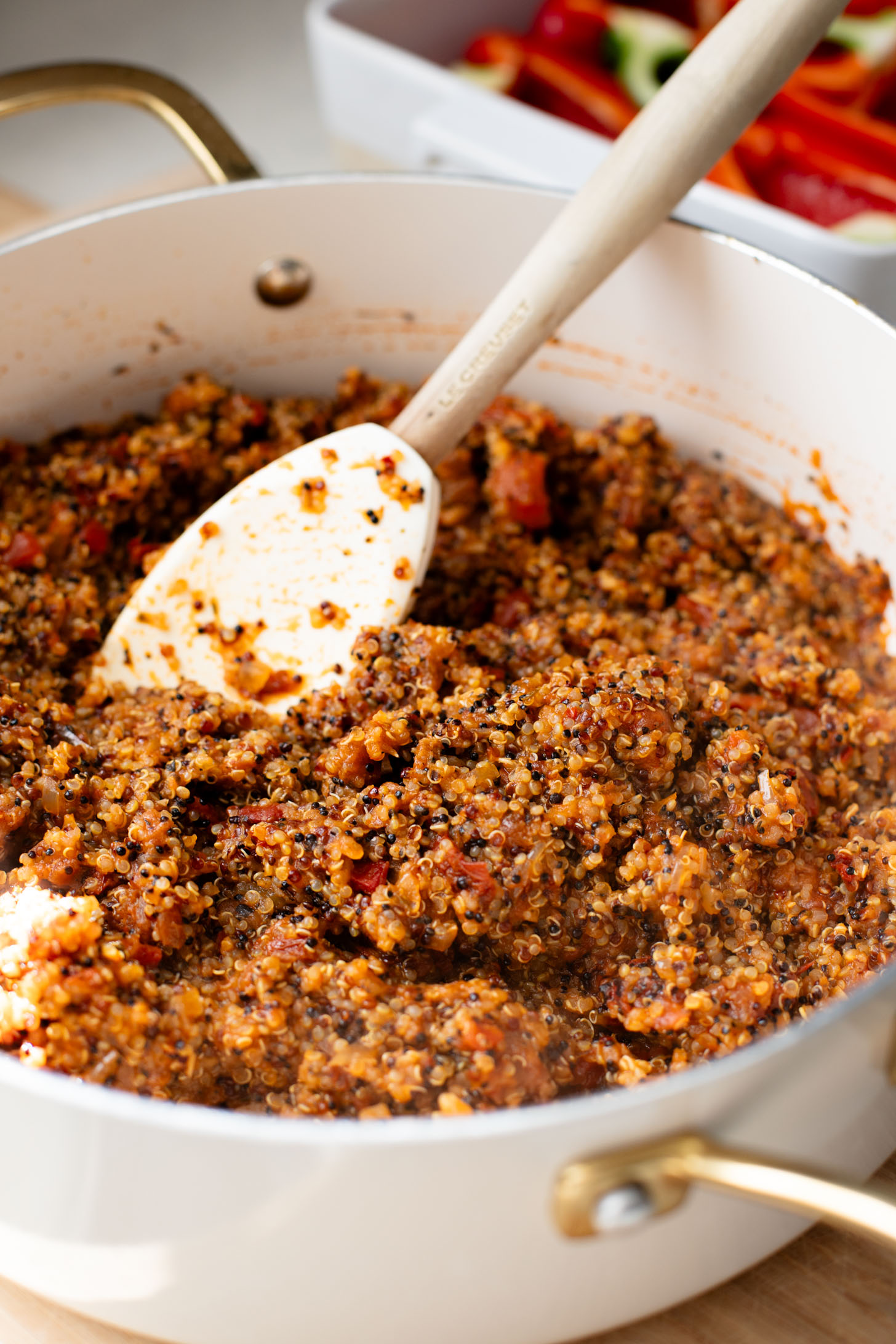 These Mediterranean Quinoa Stuffed Peppers are loaded with quinoa, vegan sausage & non-dairy feta. A delicious and veggie-packed vegan dinner | ThisSavoryVegan.com #thissavoryvegan #stuffedpeppers #highproteinveganrecipes