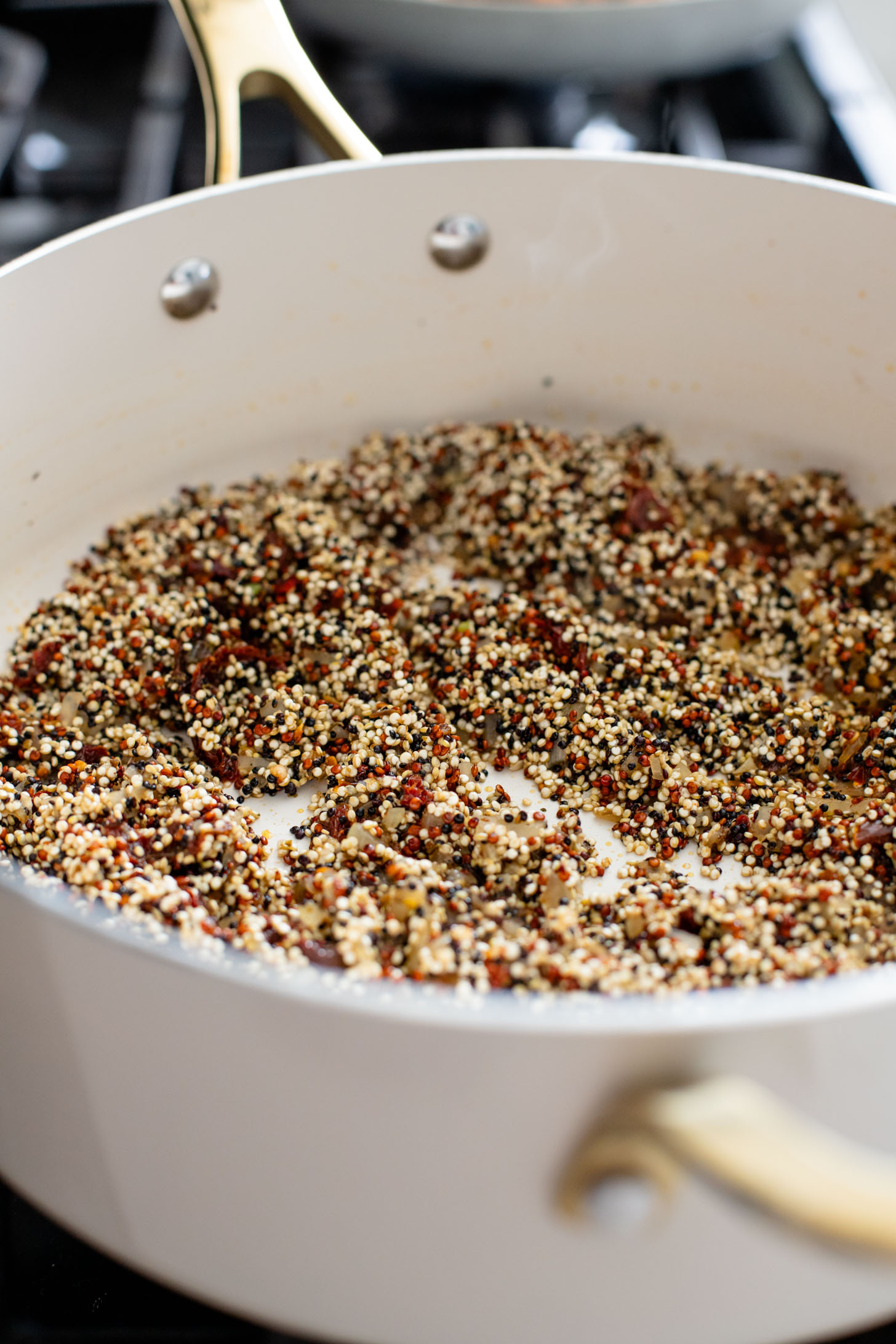 These Mediterranean Quinoa Stuffed Peppers are loaded with quinoa, vegan sausage & non-dairy feta. A delicious and veggie-packed vegan dinner | ThisSavoryVegan.com #thissavoryvegan #stuffedpeppers #highproteinveganrecipes