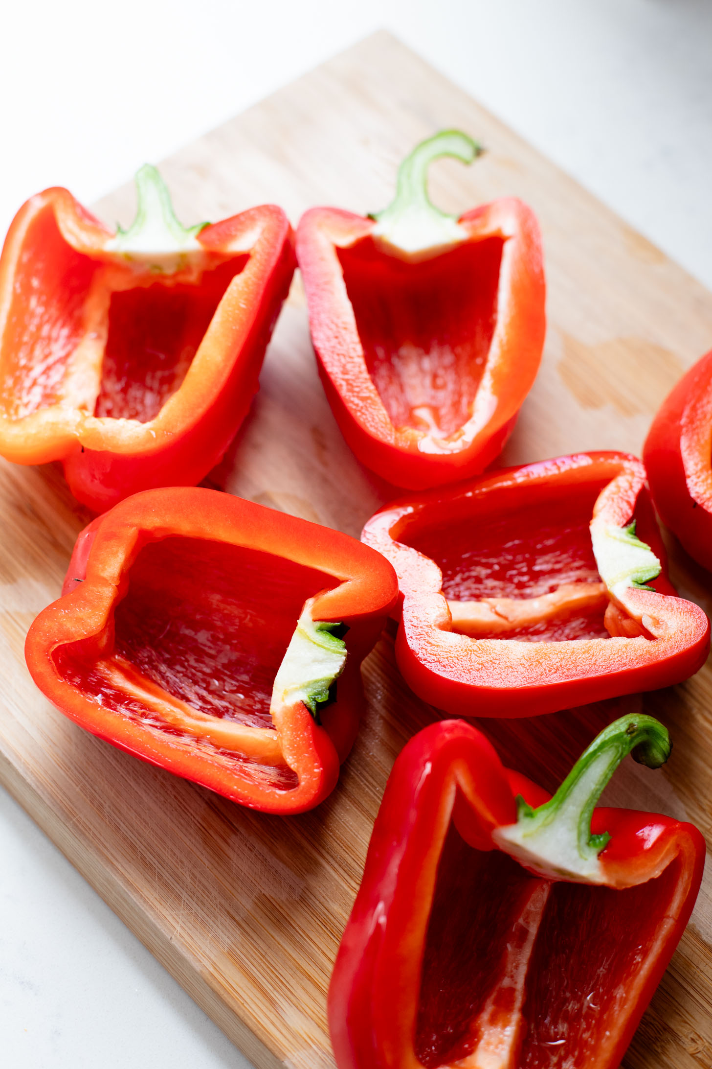These Mediterranean Quinoa Stuffed Peppers are loaded with quinoa, vegan sausage & non-dairy feta. A delicious and veggie-packed vegan dinner | ThisSavoryVegan.com #thissavoryvegan #stuffedpeppers #highproteinveganrecipes