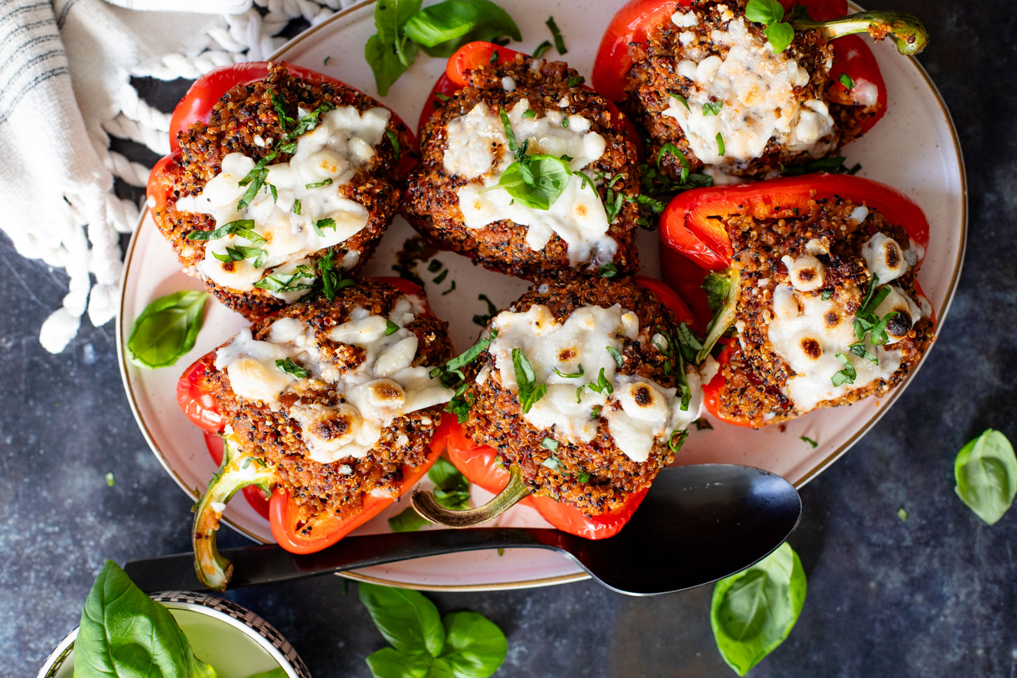 These Mediterranean Quinoa Stuffed Peppers are loaded with quinoa, vegan sausage & non-dairy feta. A delicious and veggie-packed vegan dinner | ThisSavoryVegan.com #thissavoryvegan #stuffedpeppers #highproteinveganrecipes