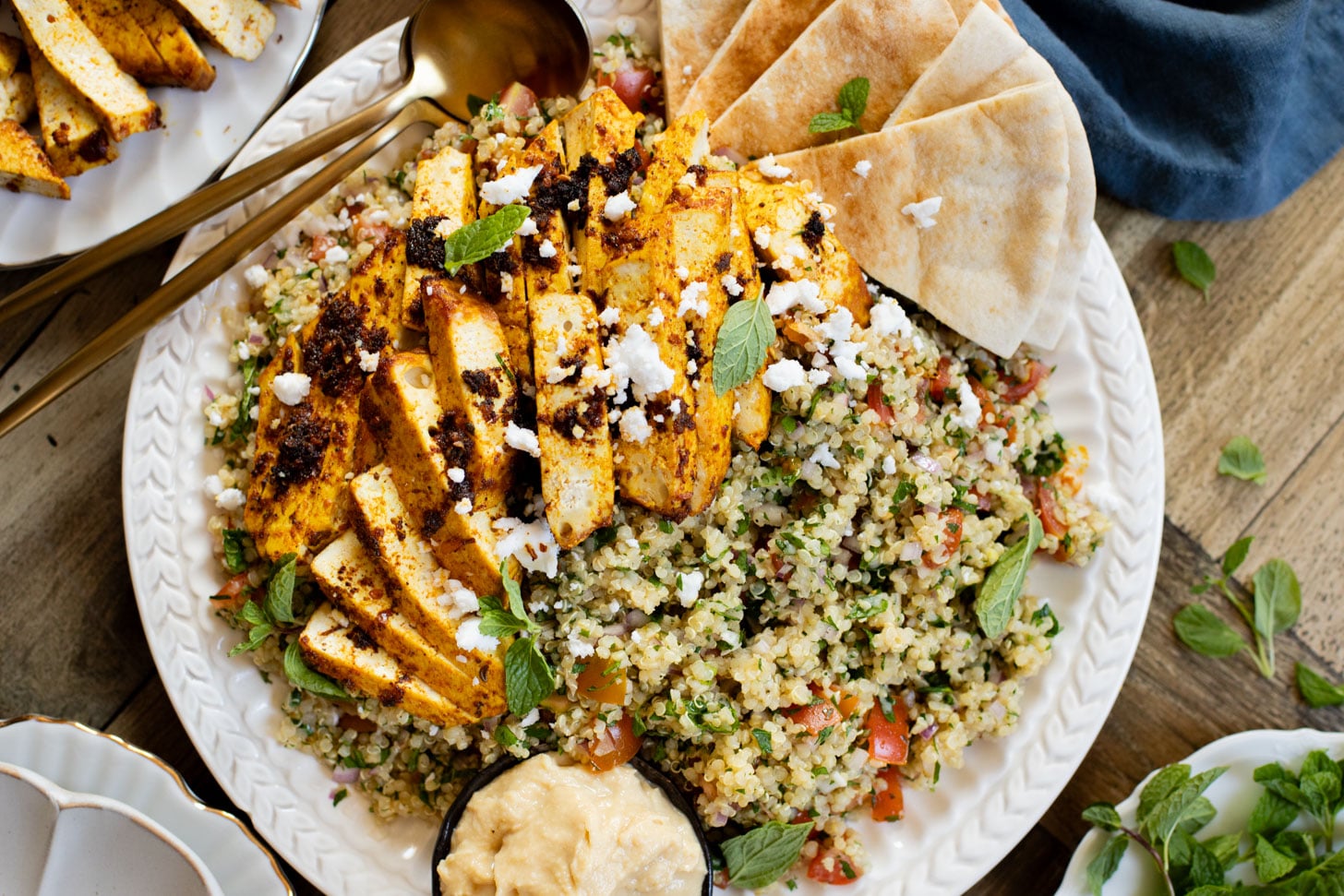 This Quinoa Tabbouleh with Baked Tofu is a high protein vegan recipe. Filled with healthy grains, fresh herbs & seasoned tofu | ThisSavoryVegan.com #thissavoryvegan #tabboulehsalad #highproteinvegan