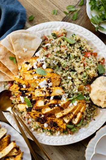 This Quinoa Tabbouleh with Baked Tofu is a high protein vegan recipe. Filled with healthy grains, fresh herbs & seasoned tofu | ThisSavoryVegan.com #thissavoryvegan #tabboulehsalad #highproteinvegan