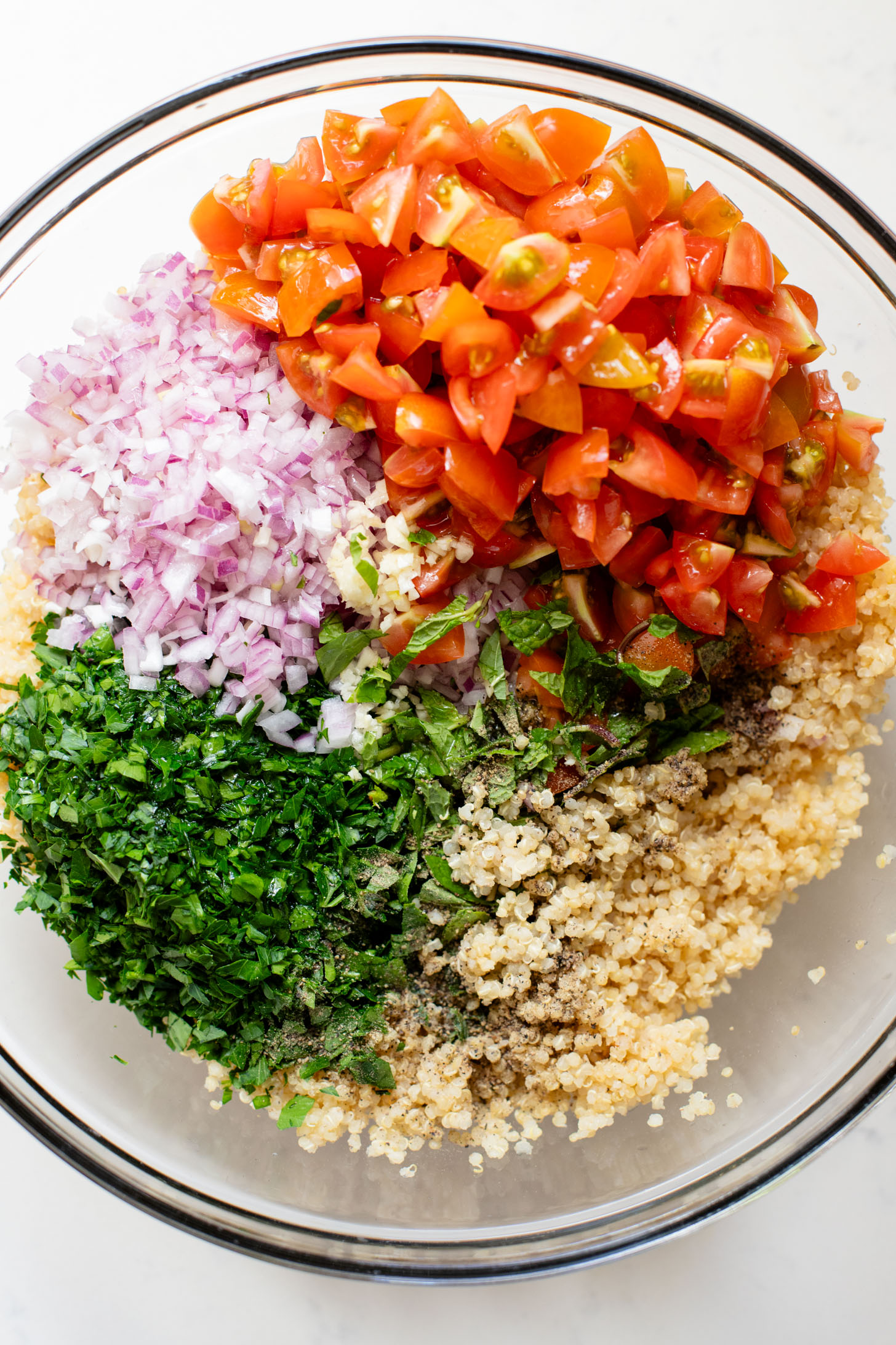 This Quinoa Tabbouleh with Baked Tofu is a high protein vegan recipe. Filled with healthy grains, fresh herbs & seasoned tofu | ThisSavoryVegan.com #thissavoryvegan #tabboulehsalad #highproteinvegan