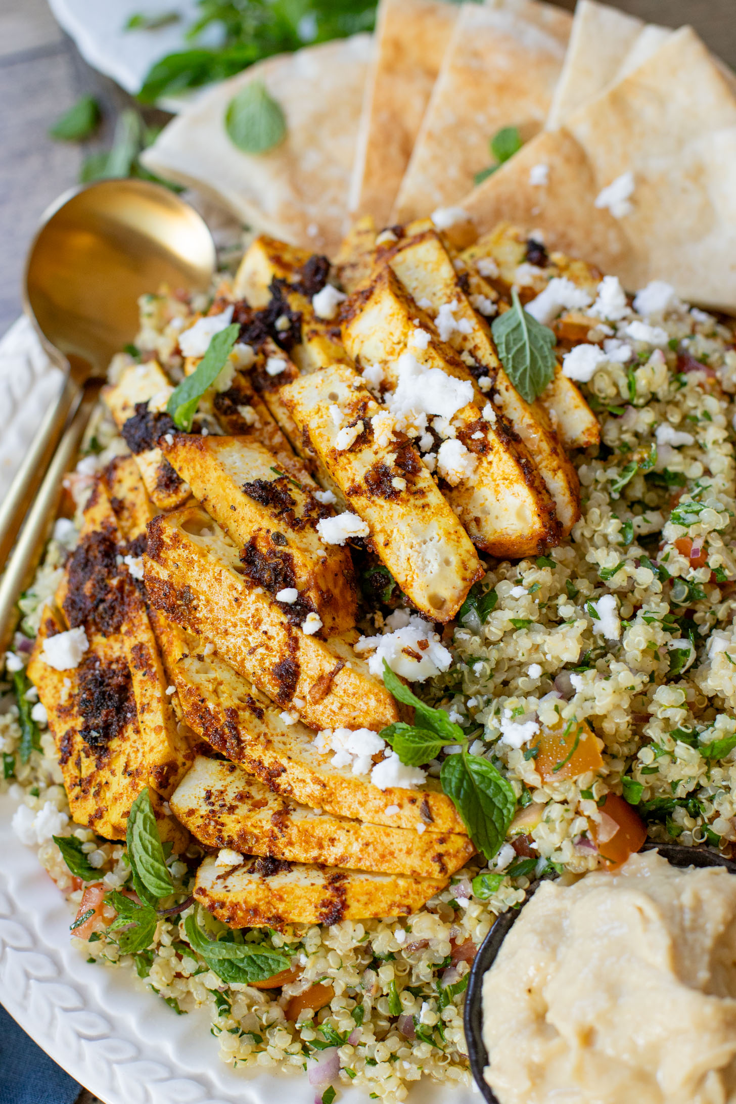 This Quinoa Tabbouleh with Baked Tofu is a high protein vegan recipe. Filled with healthy grains, fresh herbs & seasoned tofu | ThisSavoryVegan.com #thissavoryvegan #tabboulehsalad #highproteinvegan