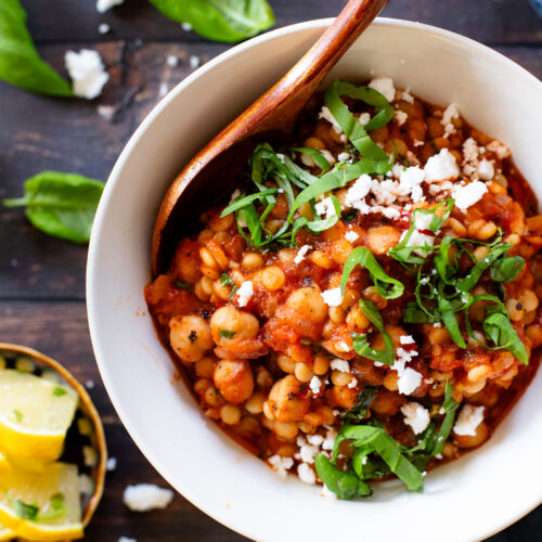 If you are looking for an easy dinner, this Simple Tomato Couscous & Chickpeas recipe is exactly what you need! Quick, easy & plant-based | ThisSavoryVegan.com #thissavoryvegan #couscous #easydinnerideas