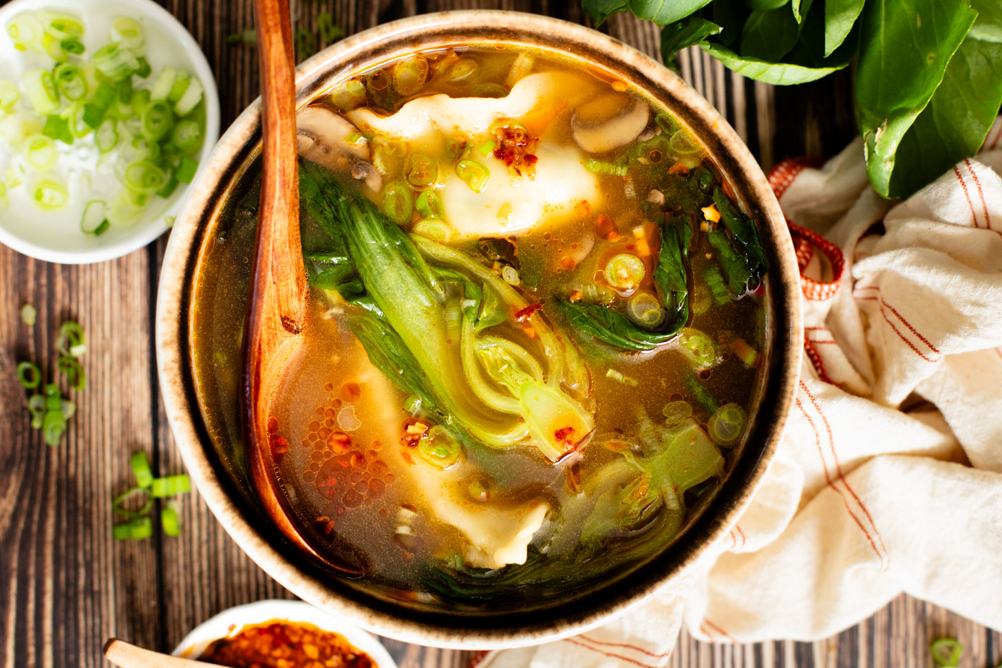 This Simple Vegan Wonton Soup comes together in 30 minutes, is a one-pot dinner and requires minimal ingredients | ThisSavoryVegan.com #thissavoryvegan #vegansoup #wontonsoup