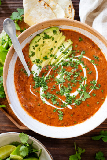 This Smoky Black Bean Soup is smooth, vegan and super simple. Perfect for meal prep and ready in less than an hour | ThisSavoryVegan.com #thissavoryvegan #vegansoup #easysouprecipes