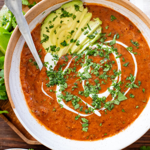 This Smoky Black Bean Soup is smooth, vegan and super simple. Perfect for meal prep and ready in less than an hour | ThisSavoryVegan.com #thissavoryvegan #vegansoup #easysouprecipes