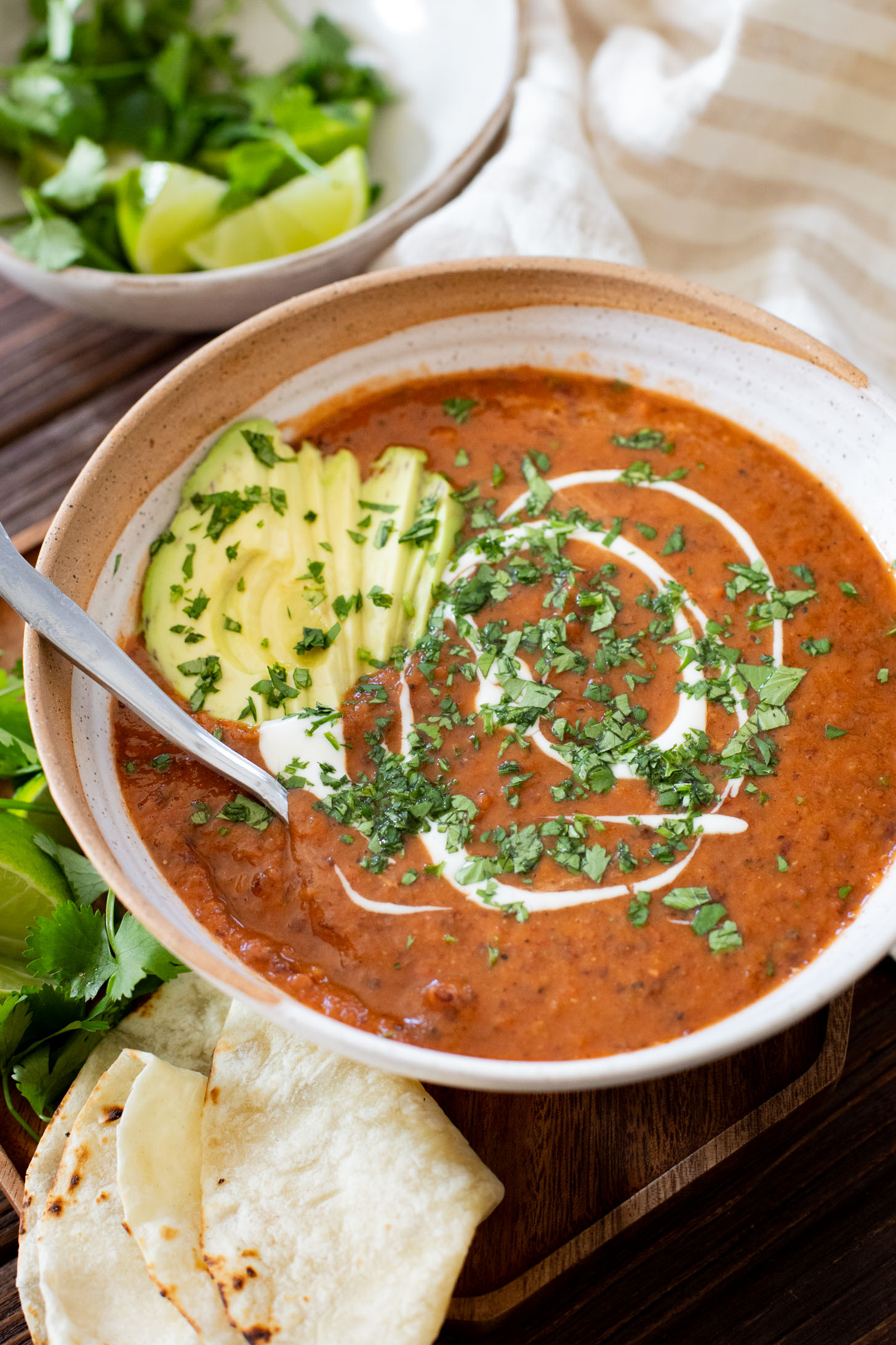 This Smoky Black Bean Soup is smooth, vegan and super simple. Perfect for meal prep and ready in less than an hour | ThisSavoryVegan.com #thissavoryvegan #vegansoup #easysouprecipes