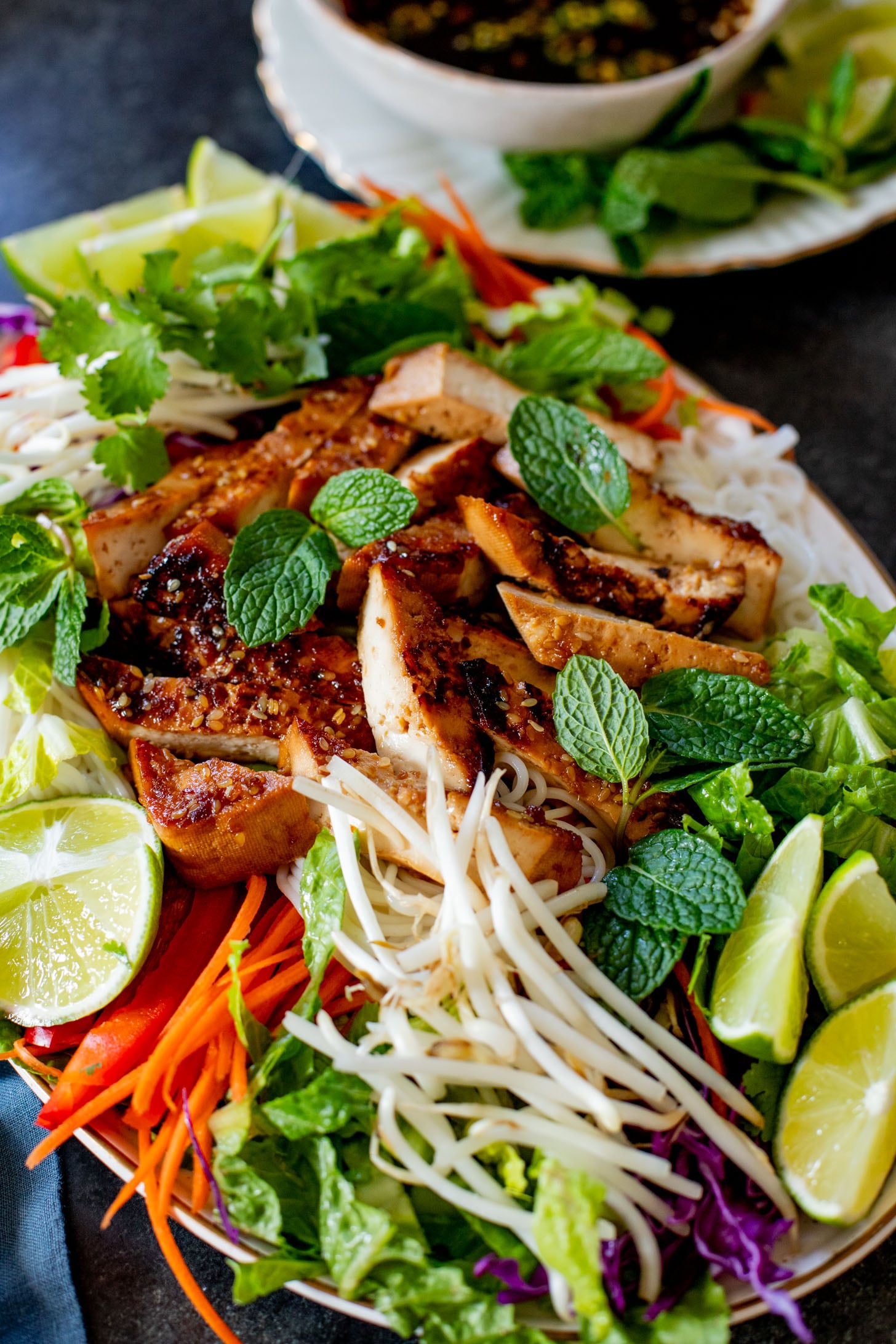 This Teriyaki Tofu & Rice Noodle Salad is the perfect healthy lunch or dinner recipe. Loaded with veggies, noodles and crispy tofu | ThisSavoryVegan.com #thissavoryvegan #noodlesalad #coldnoodlesalad