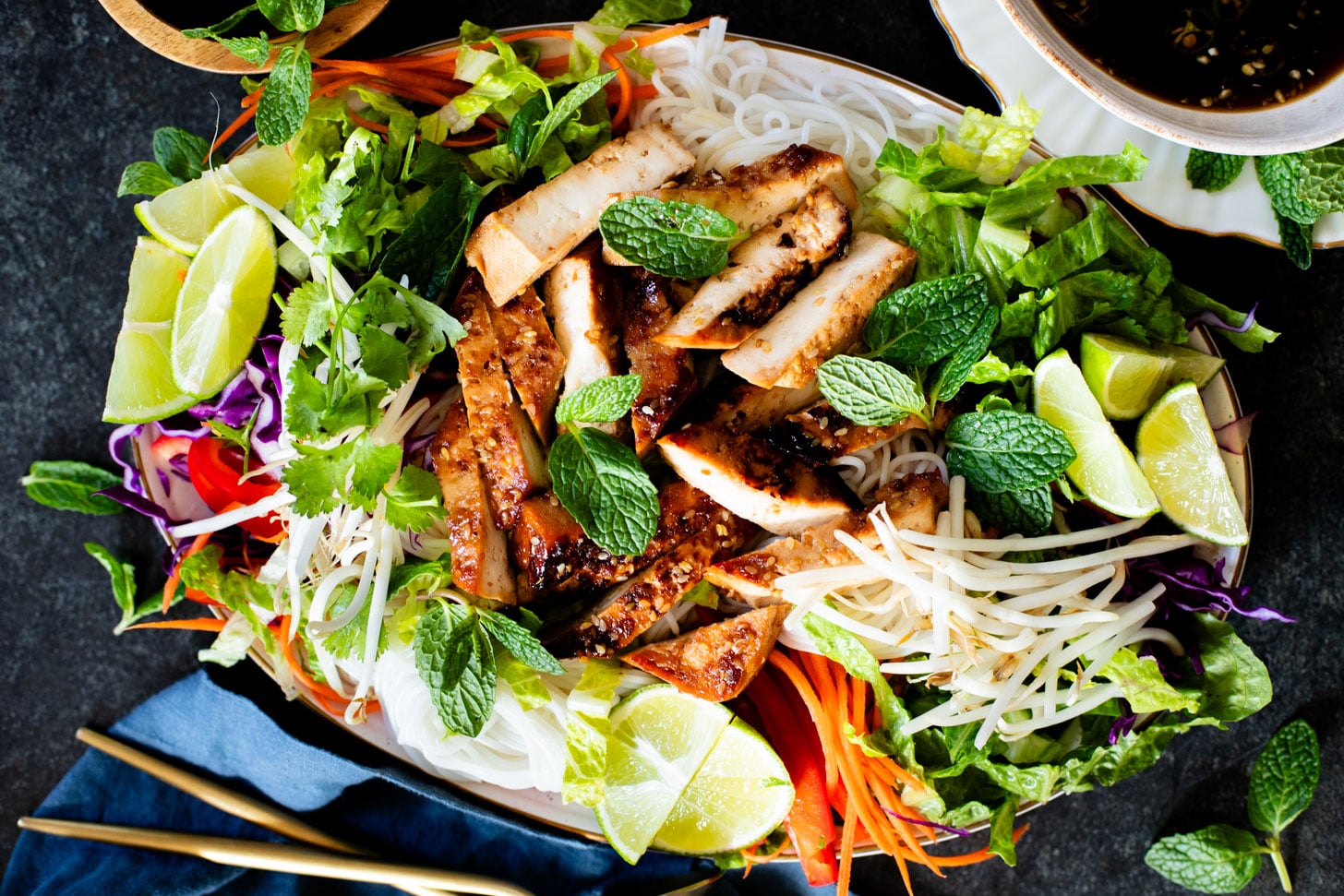 This Teriyaki Tofu & Rice Noodle Salad is the perfect healthy lunch or dinner recipe. Loaded with veggies, noodles and crispy tofu | ThisSavoryVegan.com #thissavoryvegan #noodlesalad #coldnoodlesalad