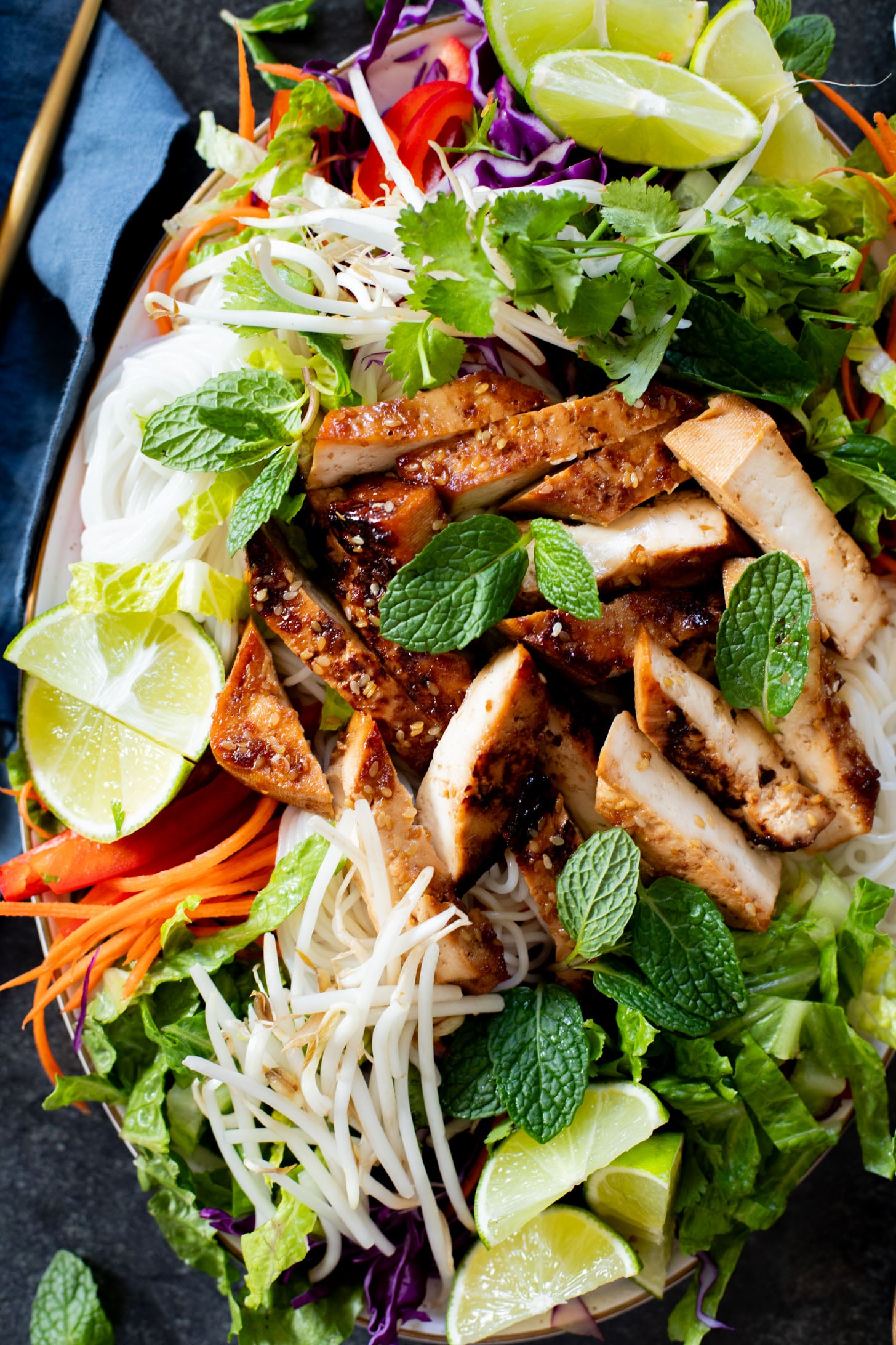 This Teriyaki Tofu & Rice Noodle Salad is the perfect healthy lunch or dinner recipe. Loaded with veggies, noodles and crispy tofu | ThisSavoryVegan.com #thissavoryvegan #noodlesalad #coldnoodlesalad
