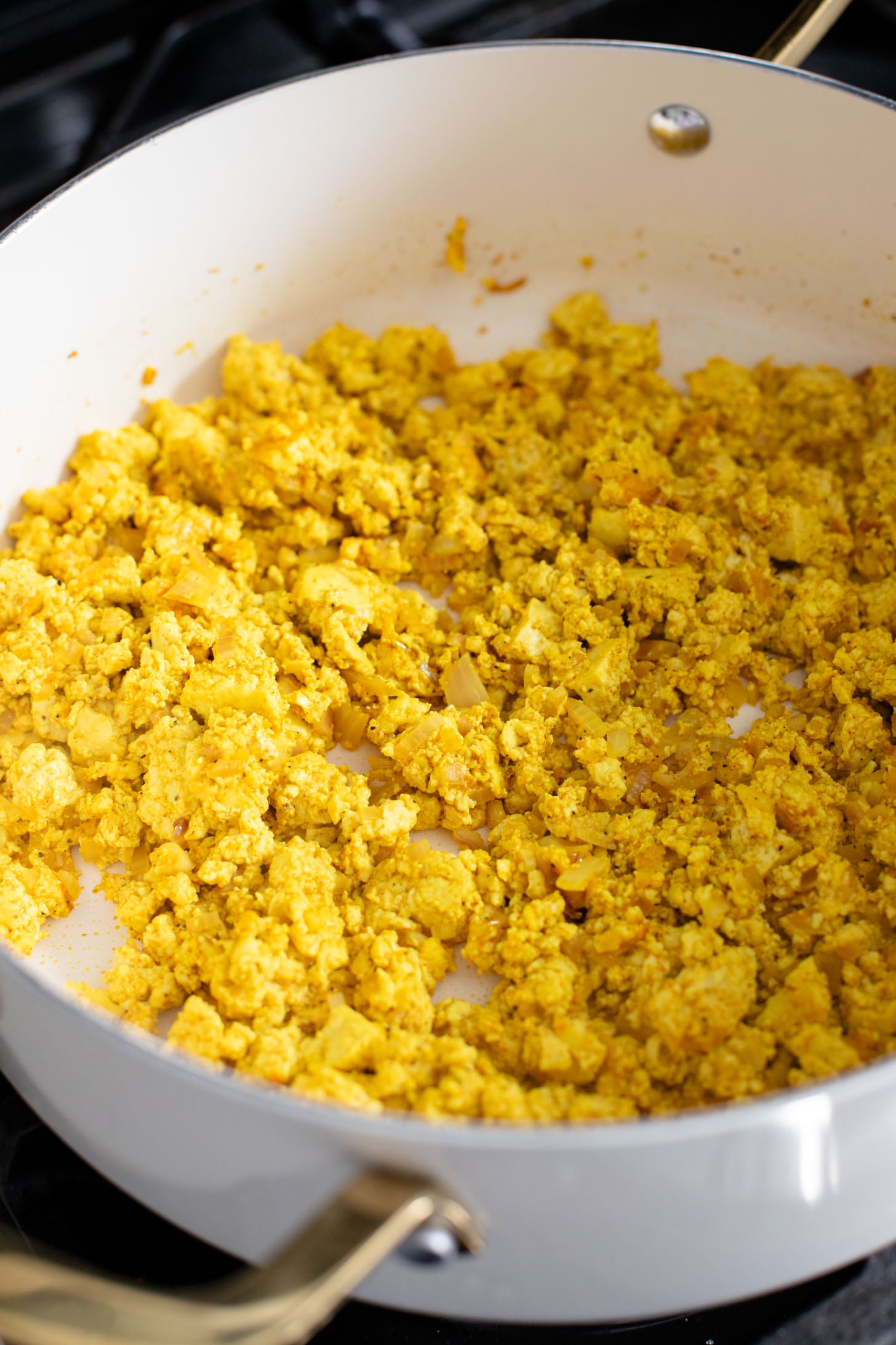 These Tofu Scramble Tacos are layered with seasoned scrambled tofu, soyrizo, pinto beans, avocado and a dairy-free chipotle ranch | ThisSavoryVegan.com #thissavoryvegan #vegantacos #veganbrunchideas