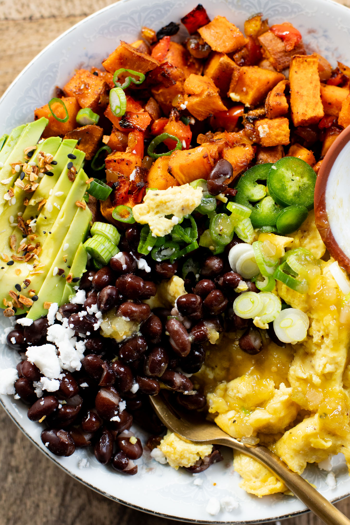 These Vegan Breakfast Bowls are healthy & delicious. Made with Just eggs, roasted sweet potatoes, black beans & avocado | ThisSavoryVegan.com #thissavoryvegan #veganbreakfastrecipes #healthybreakfast