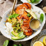 This Harvest Bowl with Maple Dijon Dressing is layered with rice, roasted sweet potatoes, crispy brussels sprouts, almond breadcrumbs & a tangy dressing | ThisSavoryVegan.com #thissavoryvegan #harvestbowl #winterrecipes